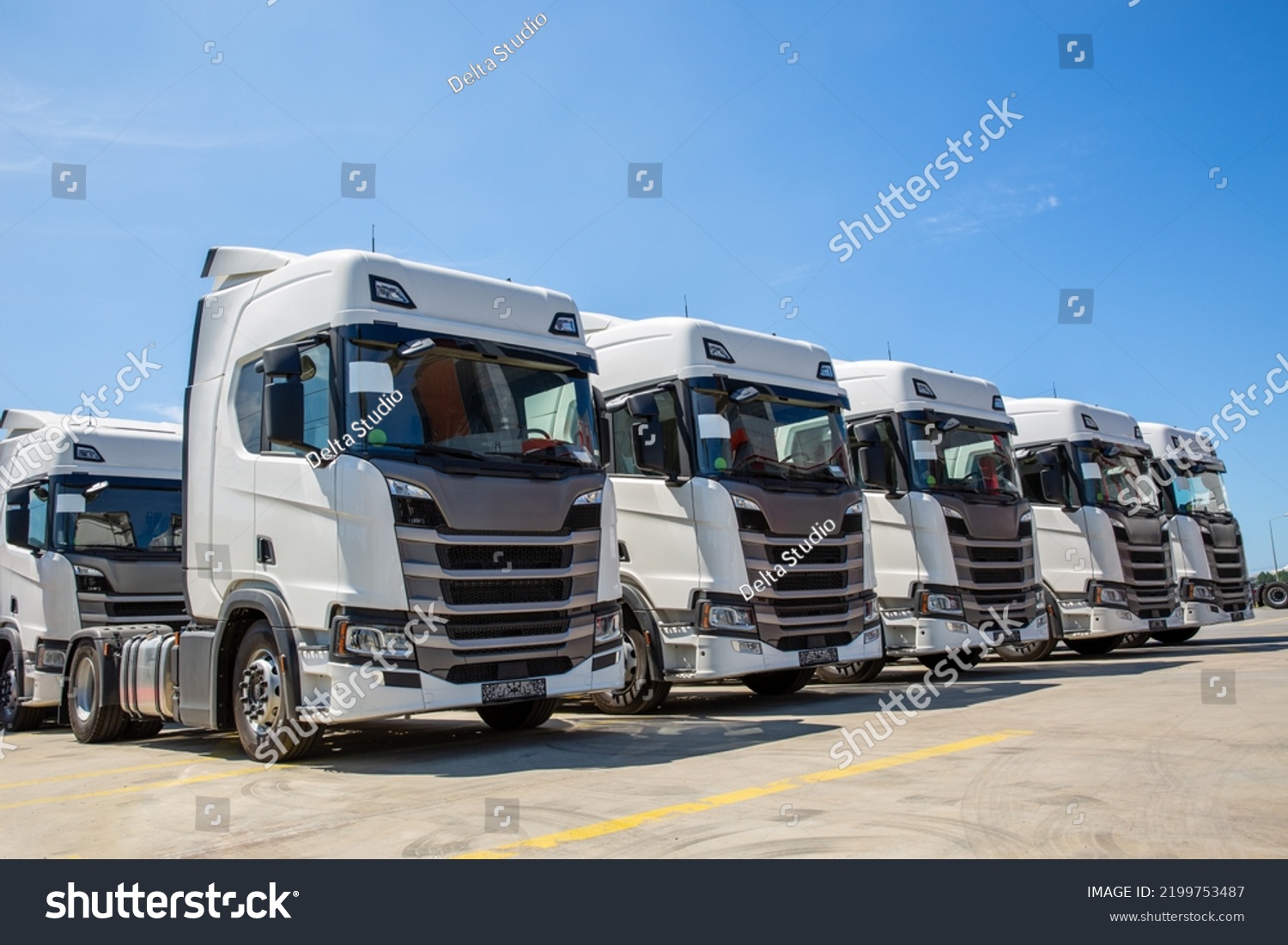 New truck fleet in the parking area #2199753487