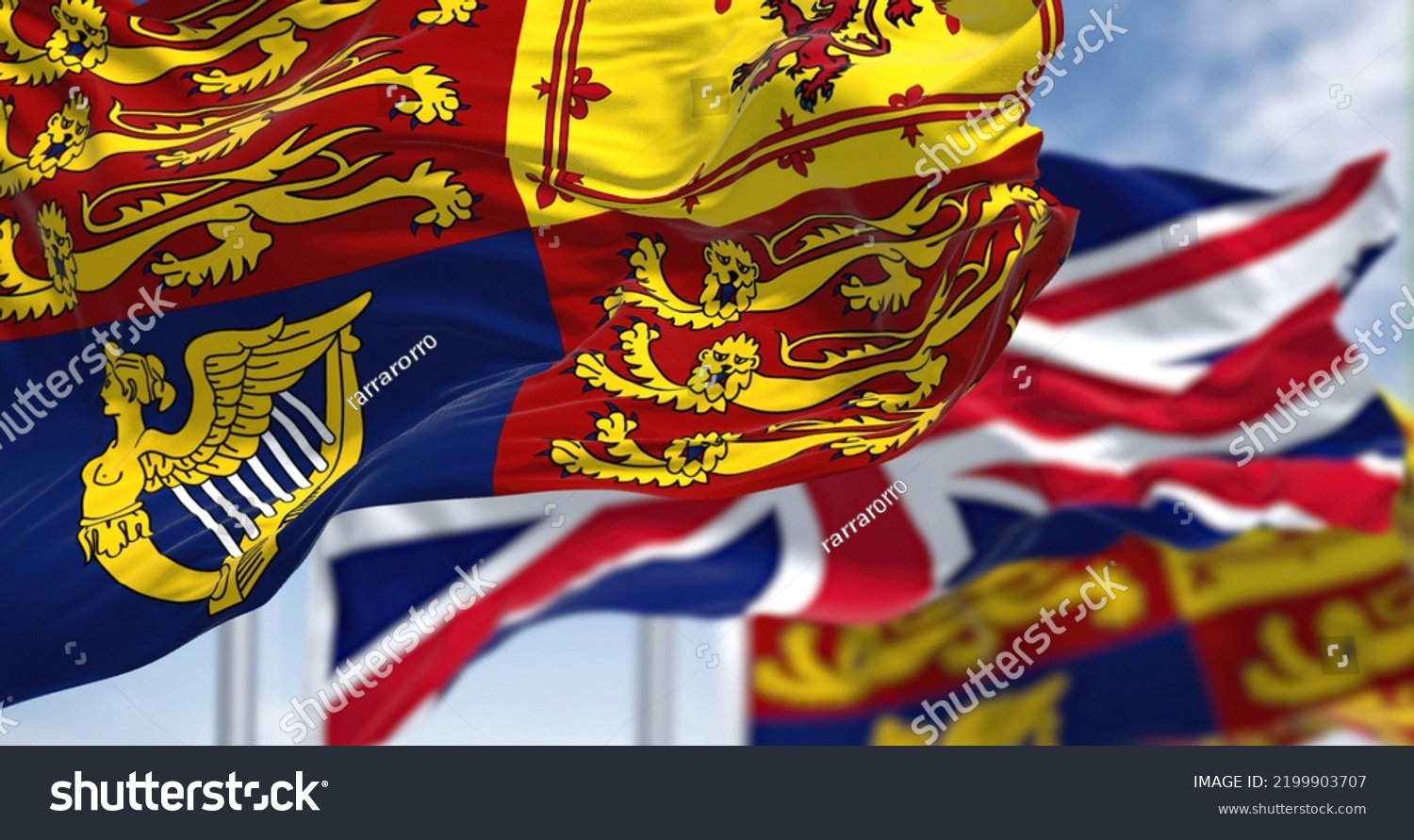 London, UK, September 2022: The Royal Standard of the United Kingdom waving the wind along with the UK flag #2199903707