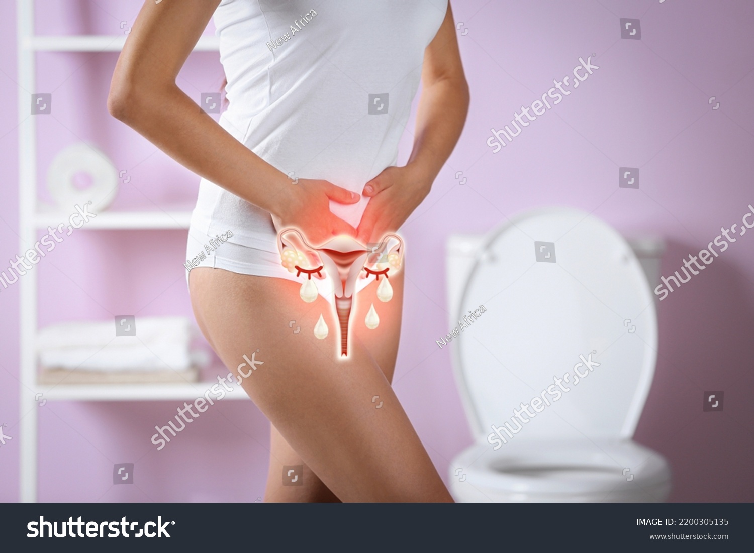 Woman holding hands on her belly and illustration of female reproductive system. Vaginal yeast infection #2200305135