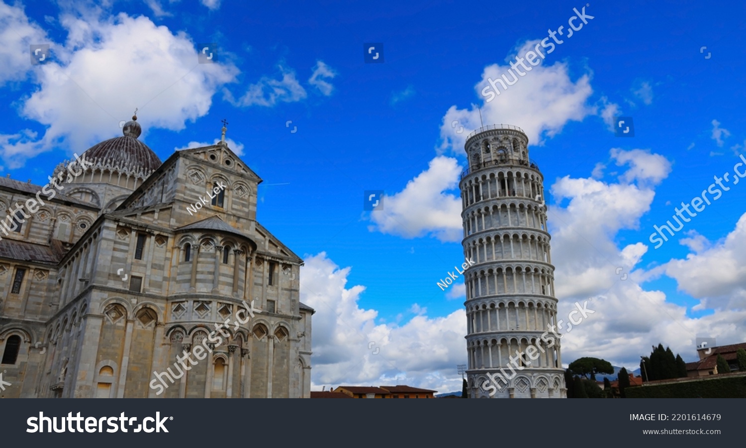 View of Cloudy blue sky in Pisa Cathedral (Duomo di Pisa) with Leaning Tower  (Torre di Pisa) Tuscany, Italy.The Leaning Tower of Pisa is one of the main landmark in Italy. #2201614679