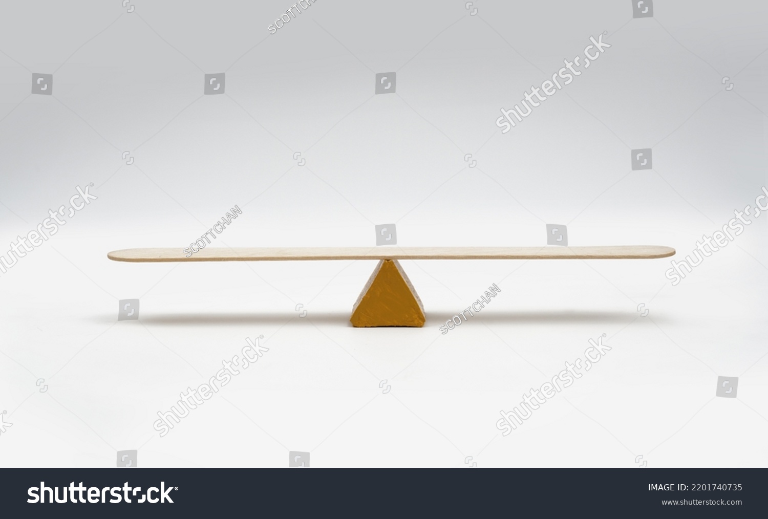 Empty seesaw balancing on white background.
 #2201740735