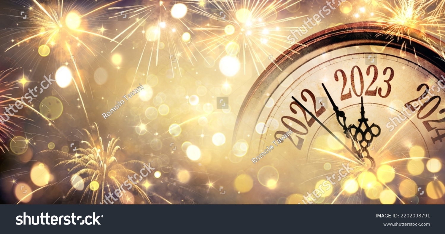 2023 New Year - Clock And Fireworks - Countdown To Midnight  - Abstract Defocused Background #2202098791