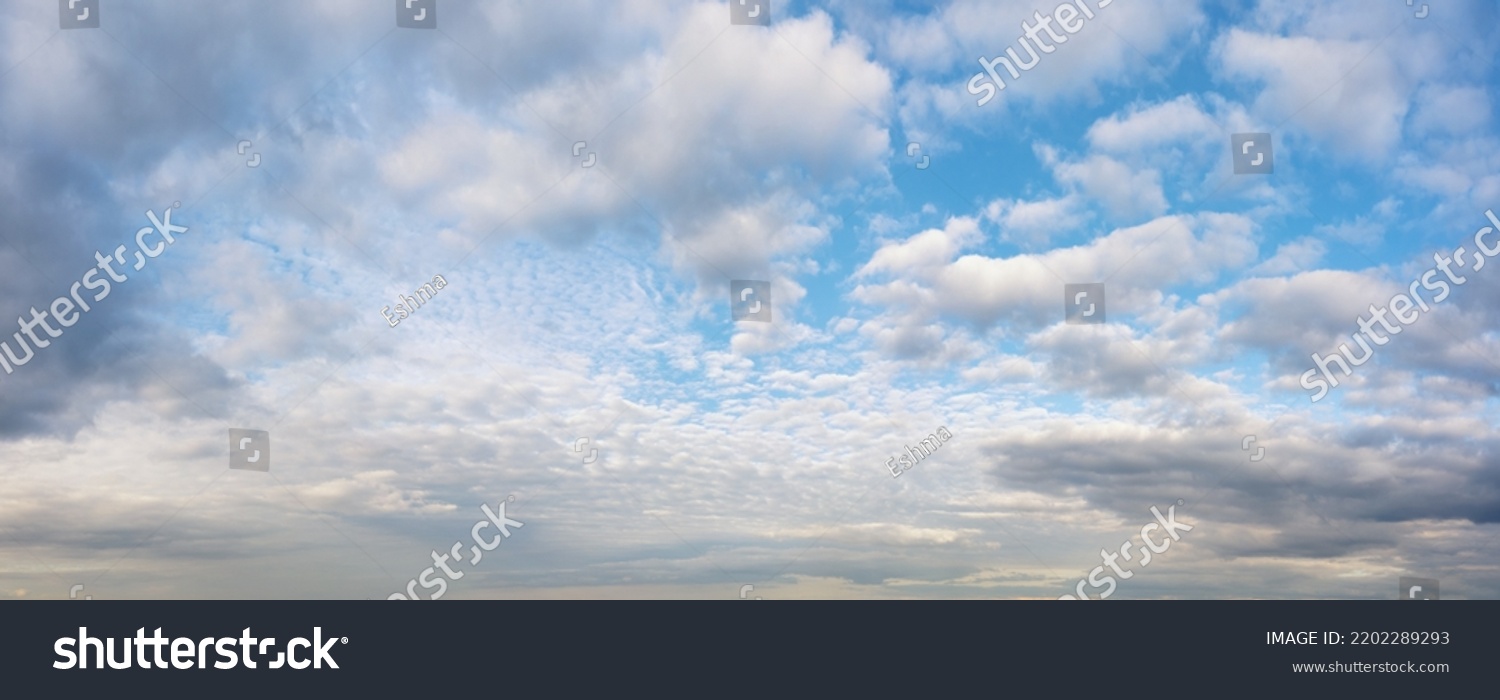 Bright colored idyllic cloudy sky at the horizon. Aerial panoramic view for natural texture and background #2202289293
