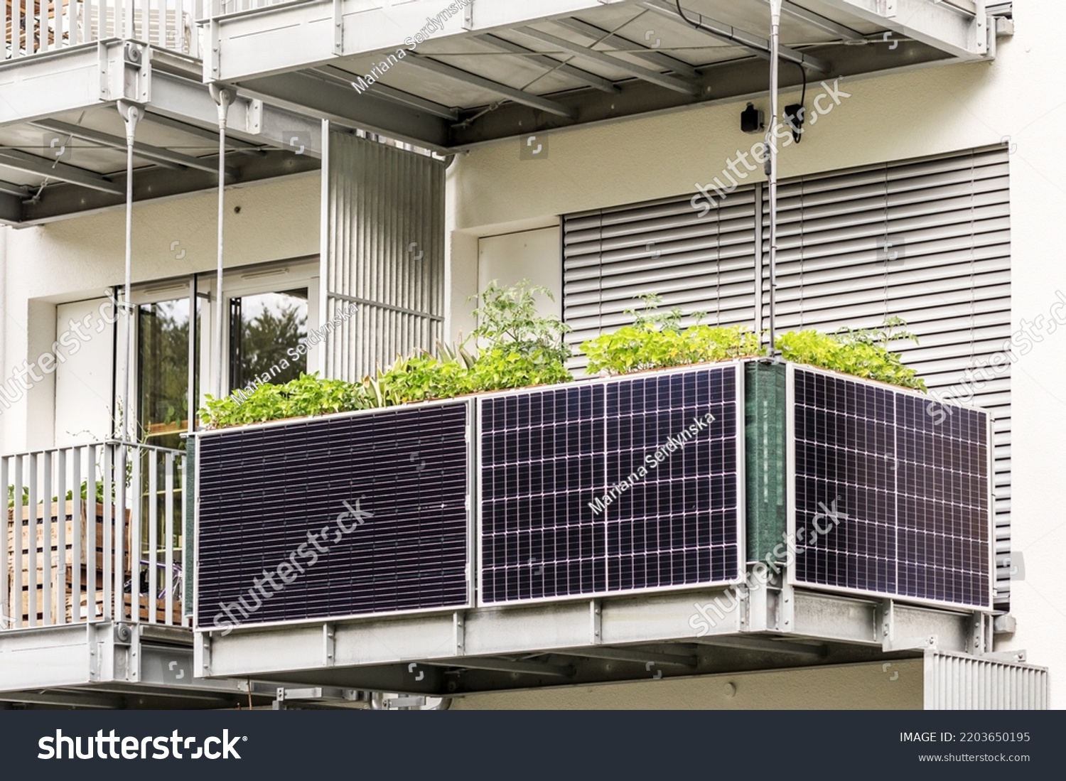 Solar panels on Balcony of  Apartment Building. Modern Balcony Apartment Solar power panel. #2203650195