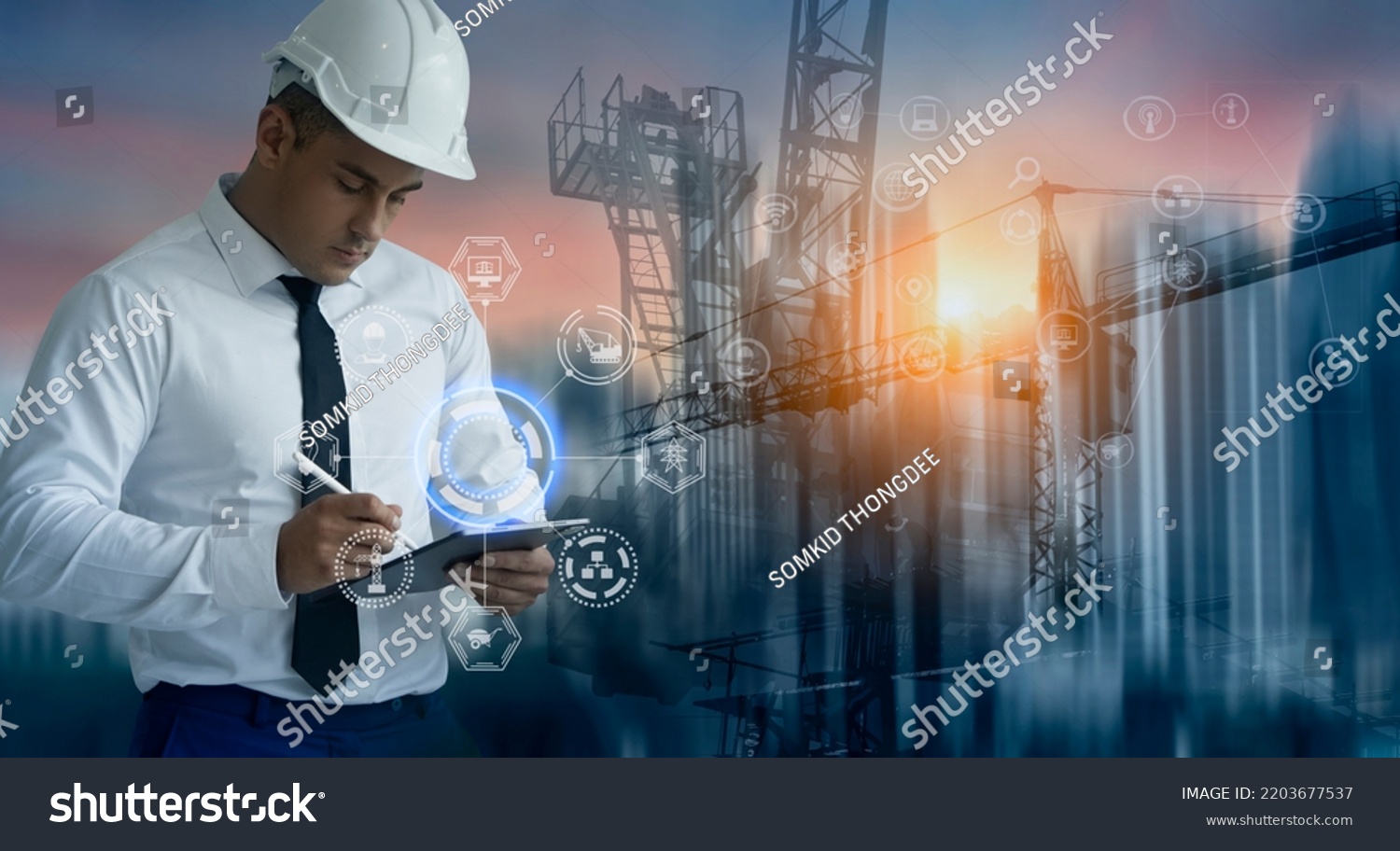 Double exposure engineering working with tablet and digital technology interfaces icon and construction cranes on city background, Smart industry and digital technology and IOT software concept. #2203677537
