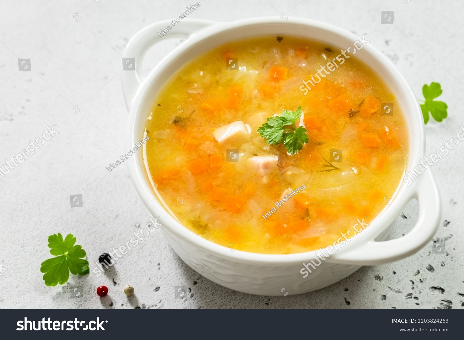 Healthy split pea soup with ham in bowl. Top view, copy space, flat lay. #2203824263
