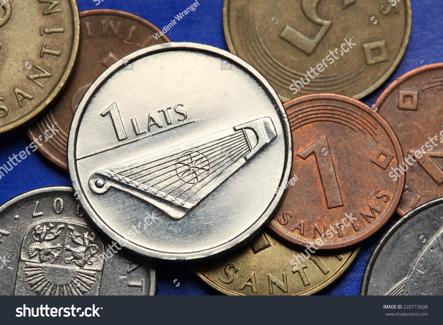 Coins of Latvia. A kokle, a Latvian plucked string musical instrument, depicted in old Latvian one lats coin.  #220715608