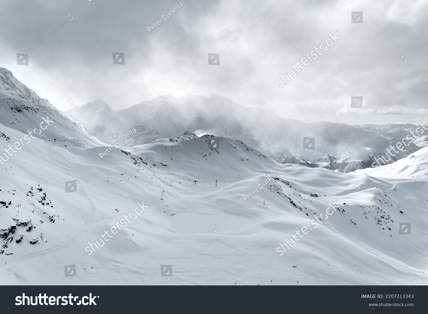 Skiing slope in the French Alpes, fog #2207213343