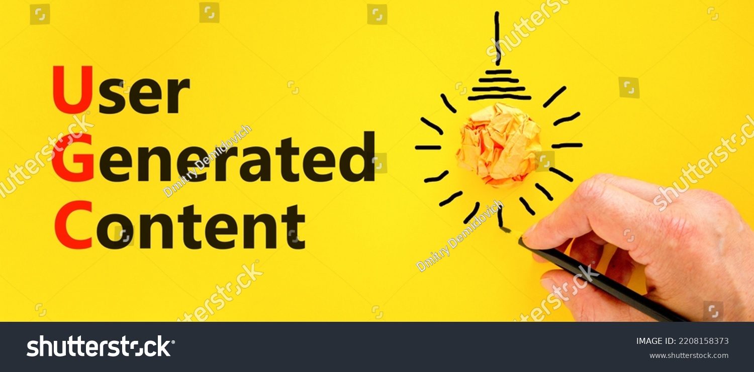 UGC user generated content symbol. Concept words UGC user generated content on a beautiful yellow background. Orange light bulb icon. Business and UGC user generated content concept. Copy space. #2208158373
