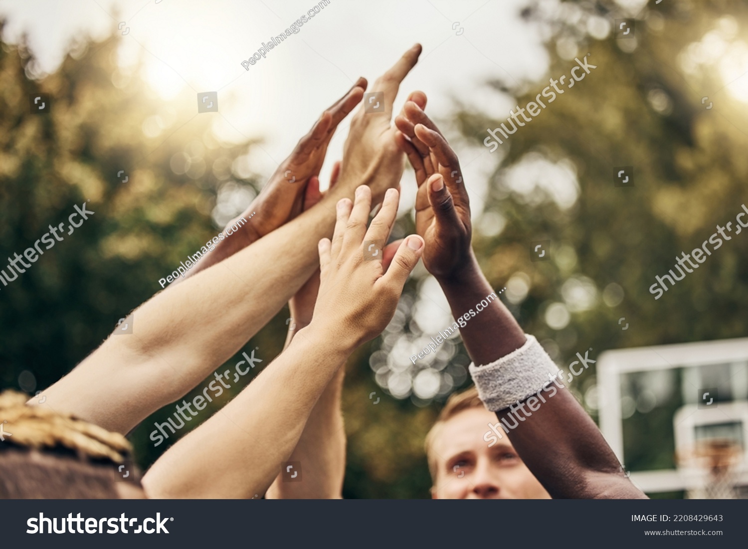 Basketball, winner and hands, team high five for outdoor game. Success, diversity and victory goal for sports for men. Teamwork, diversity and support, friends on basketball court together with coach #2208429643