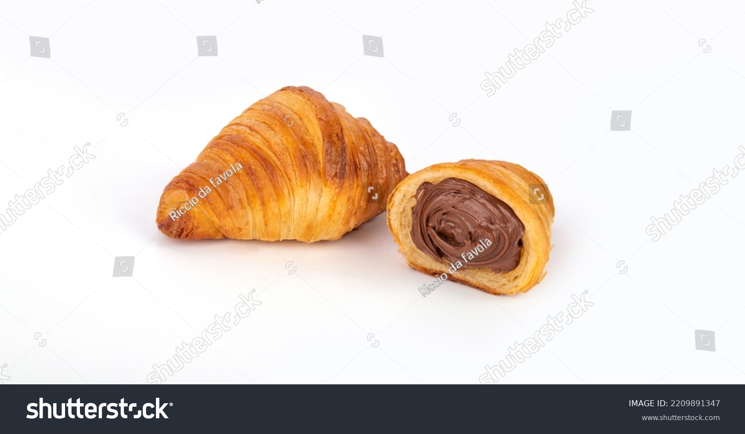 Fresh croissants with chocolate. Croissant with chocolate filling with shadows on a white background. Fresh french croissant. Italian pastry #2209891347