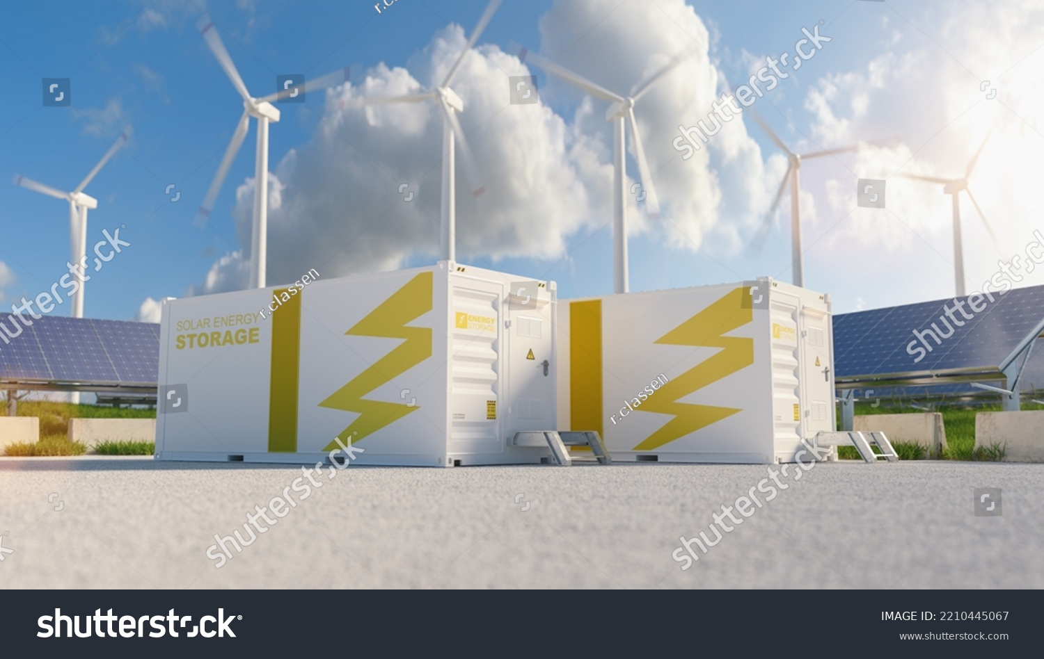 modern battery energy storage system with wind turbines and solar panel power plants in background. New energy concept image #2210445067