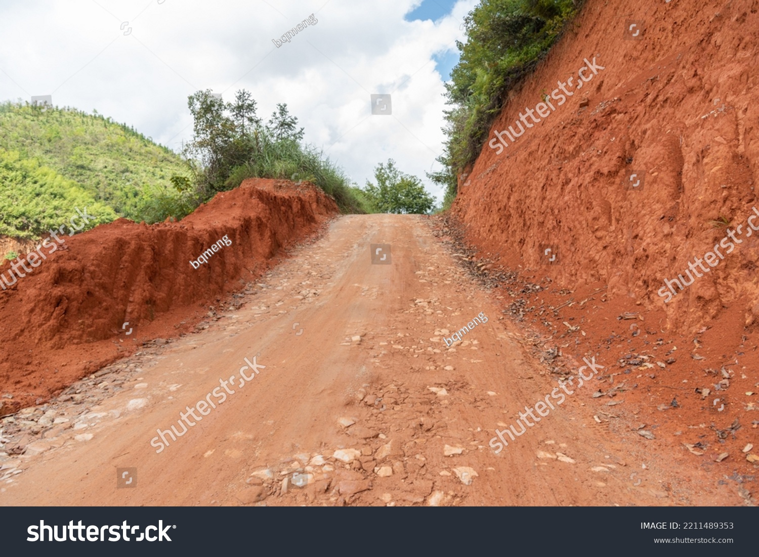 Rural mountain dirt uphill road view #2211489353