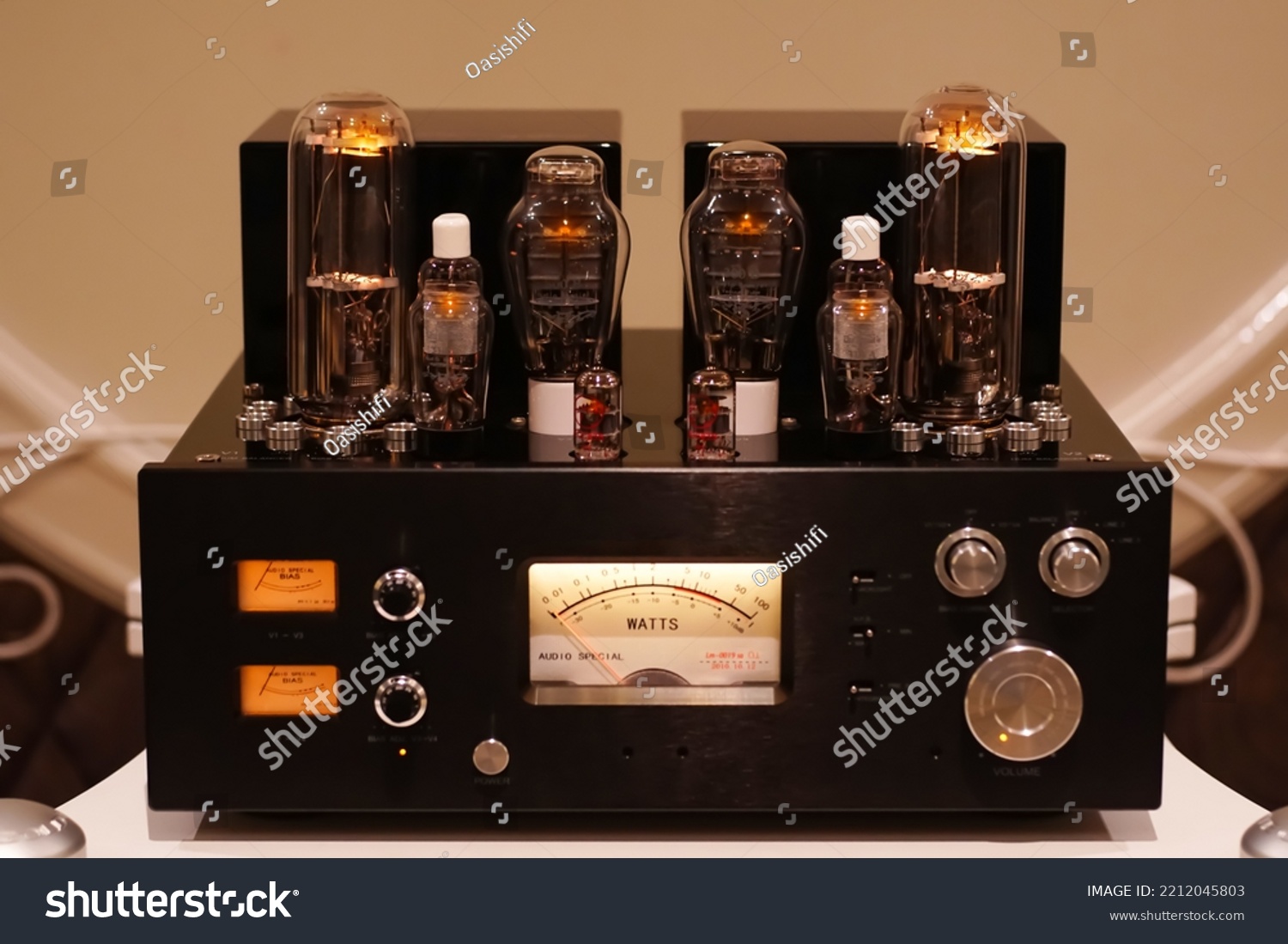 Vacuum tube stereo amplifier. Hi end power amplifier with glowing bulb diode lamp for sound reproduction, Natural sound concept, Electronic vacuum tube or glowing tubes in antique radio                #2212045803