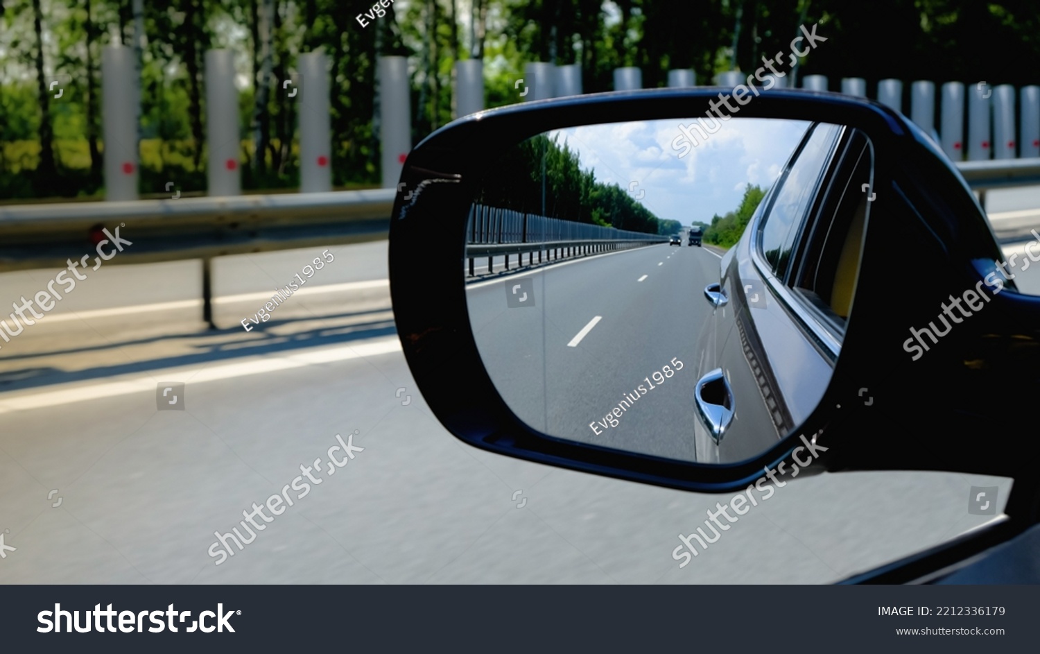 look in the rear view mirror of a car #2212336179