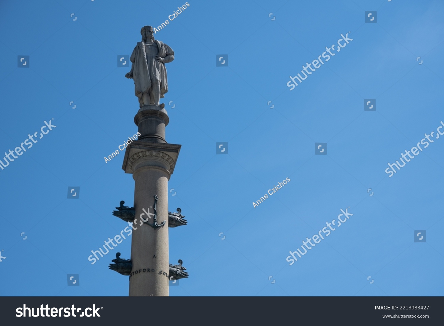 The Columbus Monument by Italian sculptor Gaetano Russo (1892) in Columbus Circle in New York City, seen against a blue sky #2213983427