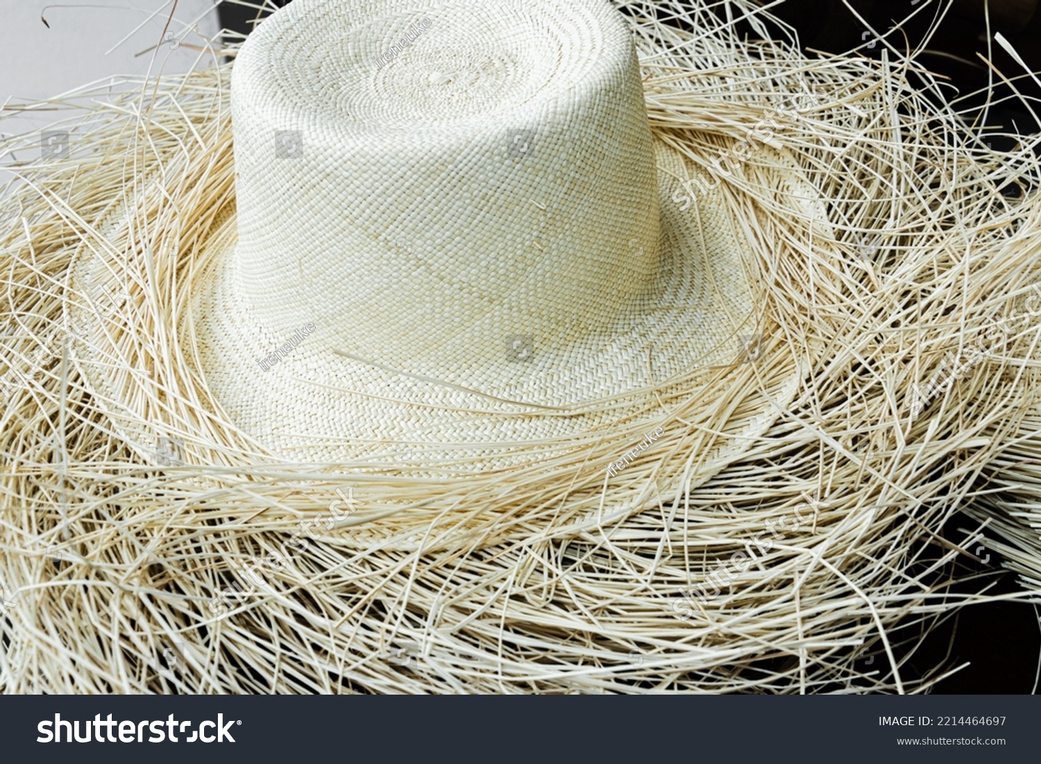 An authentic ecuadorian handmade Panama hat or Paja Toquilla Hat, weaving from straw. Popular souvenir from South America. Cuenca, Ecuador #2214464697