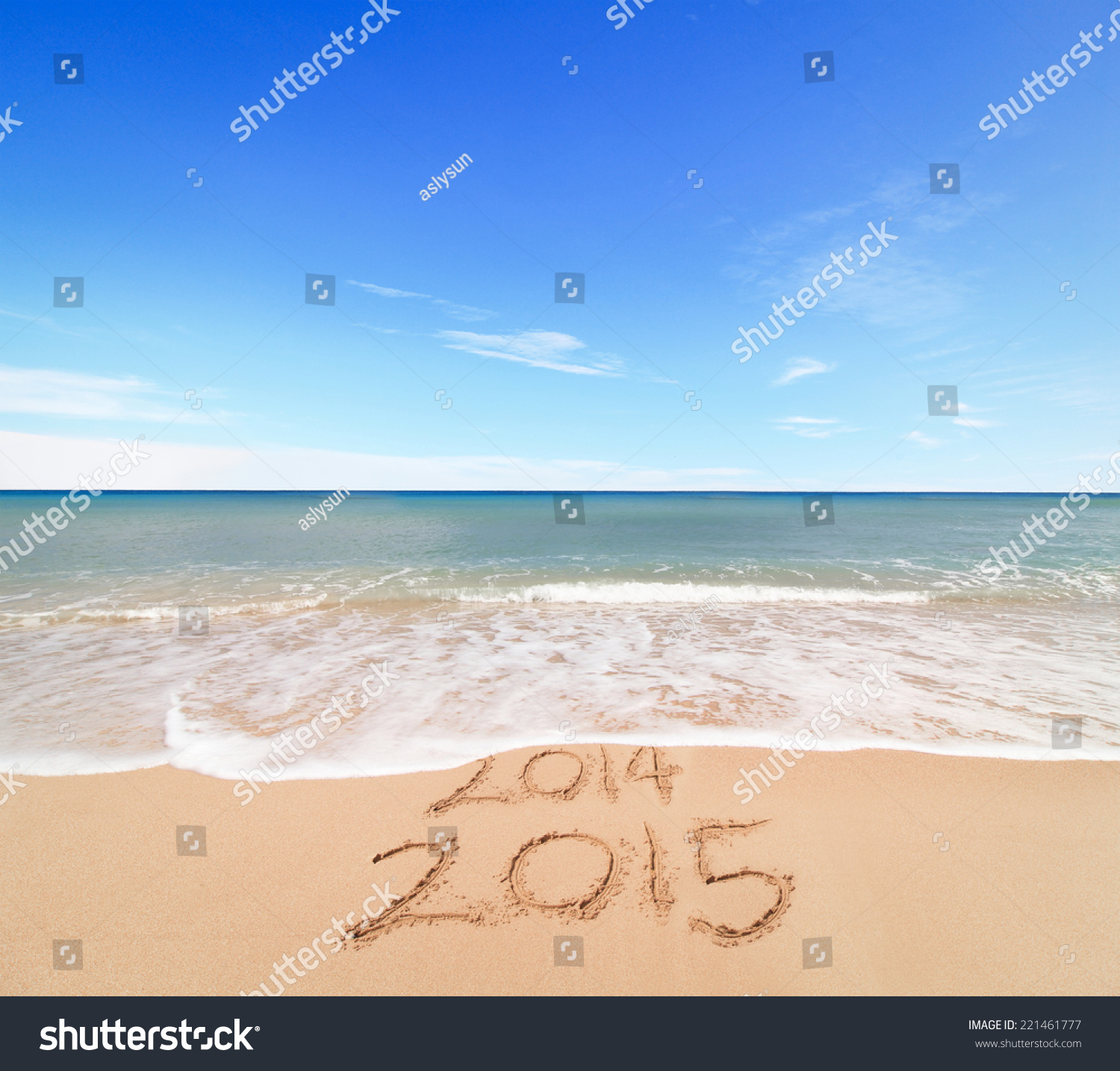 New Year 2015 is coming concept - inscription 2014 and 2015 on a beach sand, the wave is covering digits 2014 #221461777