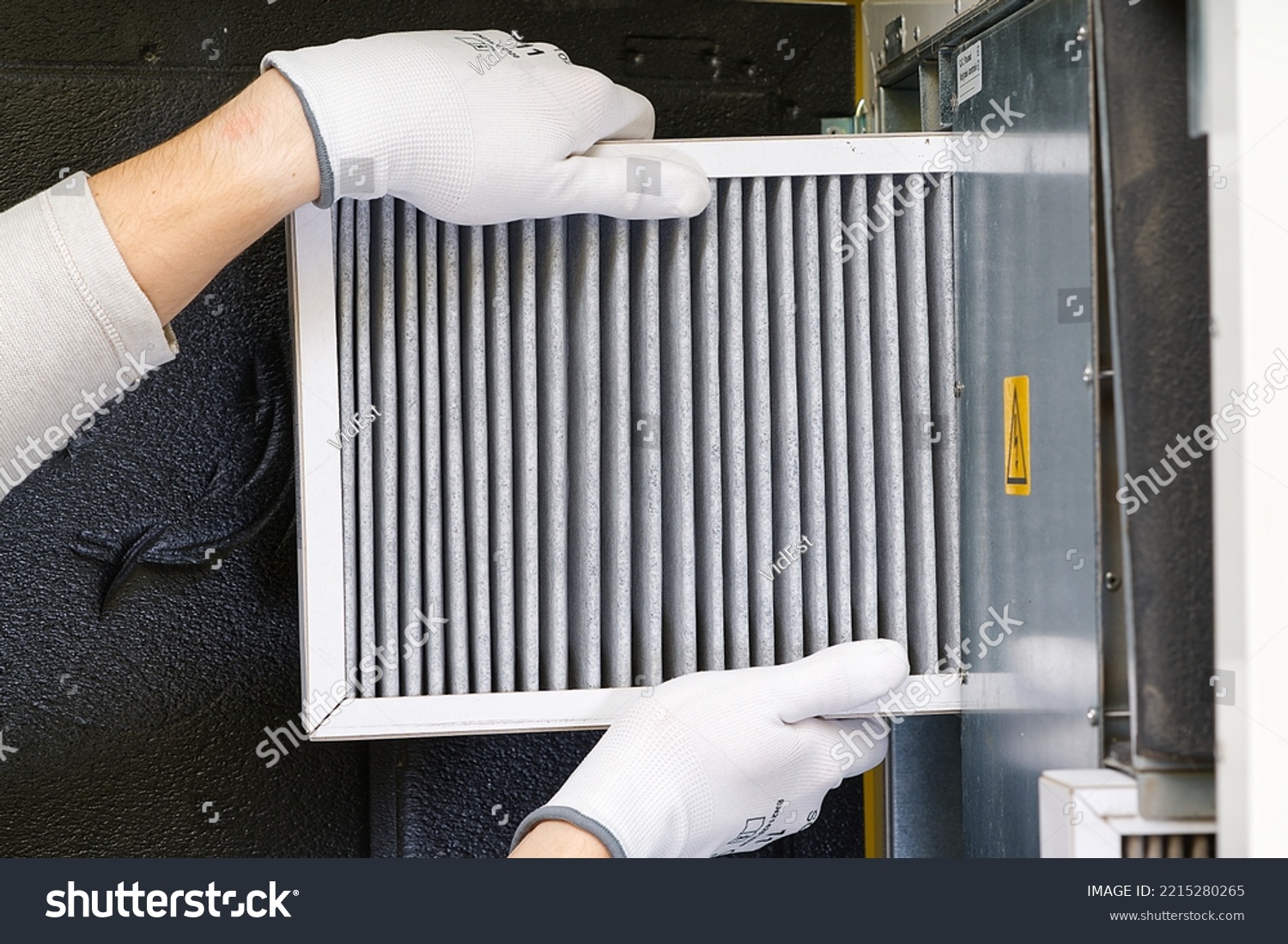 hvac filter replacing. Replacing the filter in the central ventilation system, furnace. Replacing Dirty Air filter for home central air conditioning system. Change filter in rotary heat exchanger #2215280265