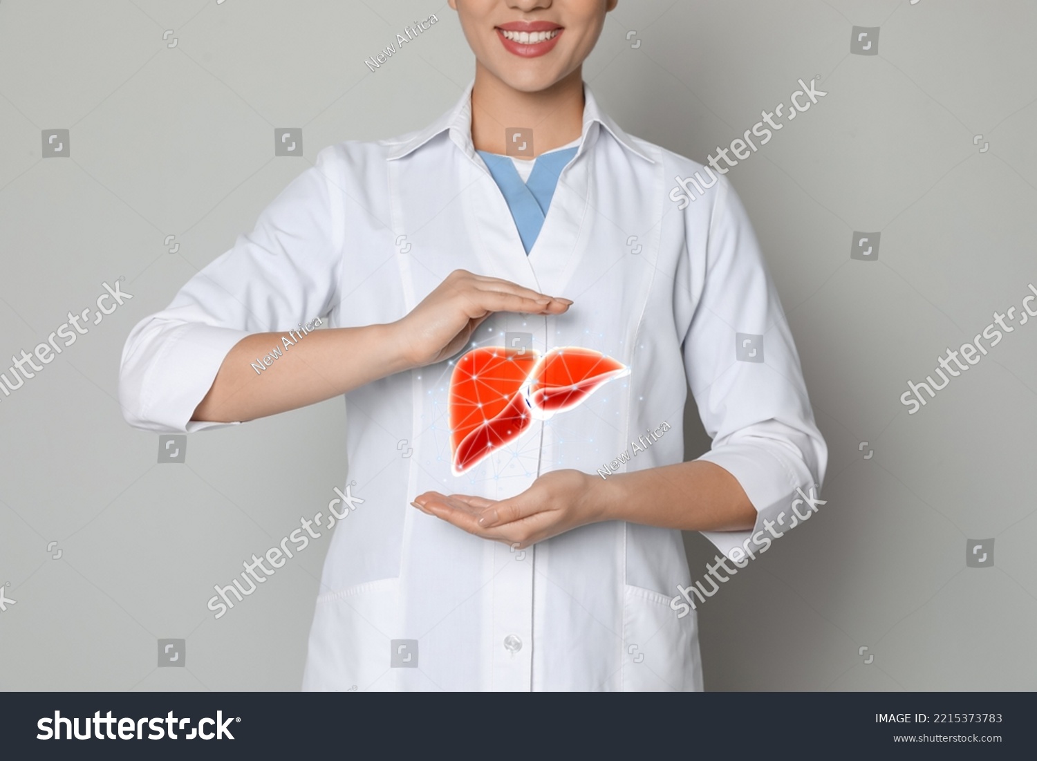 Doctor and illustration of healthy liver on beige background, closeup #2215373783