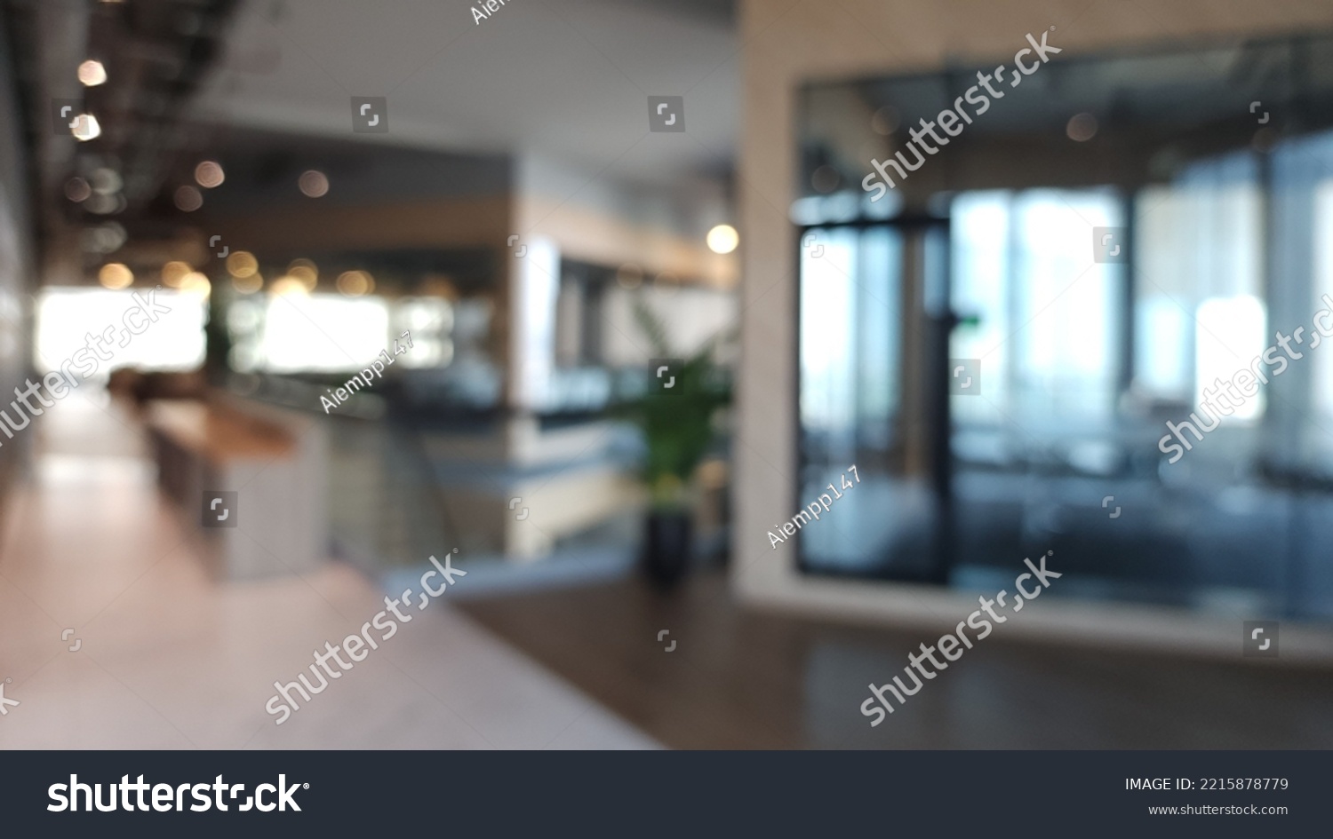 Blur focus of Fashion and modern office interiors. Front view of a loft open space office interior. Blur background. #2215878779