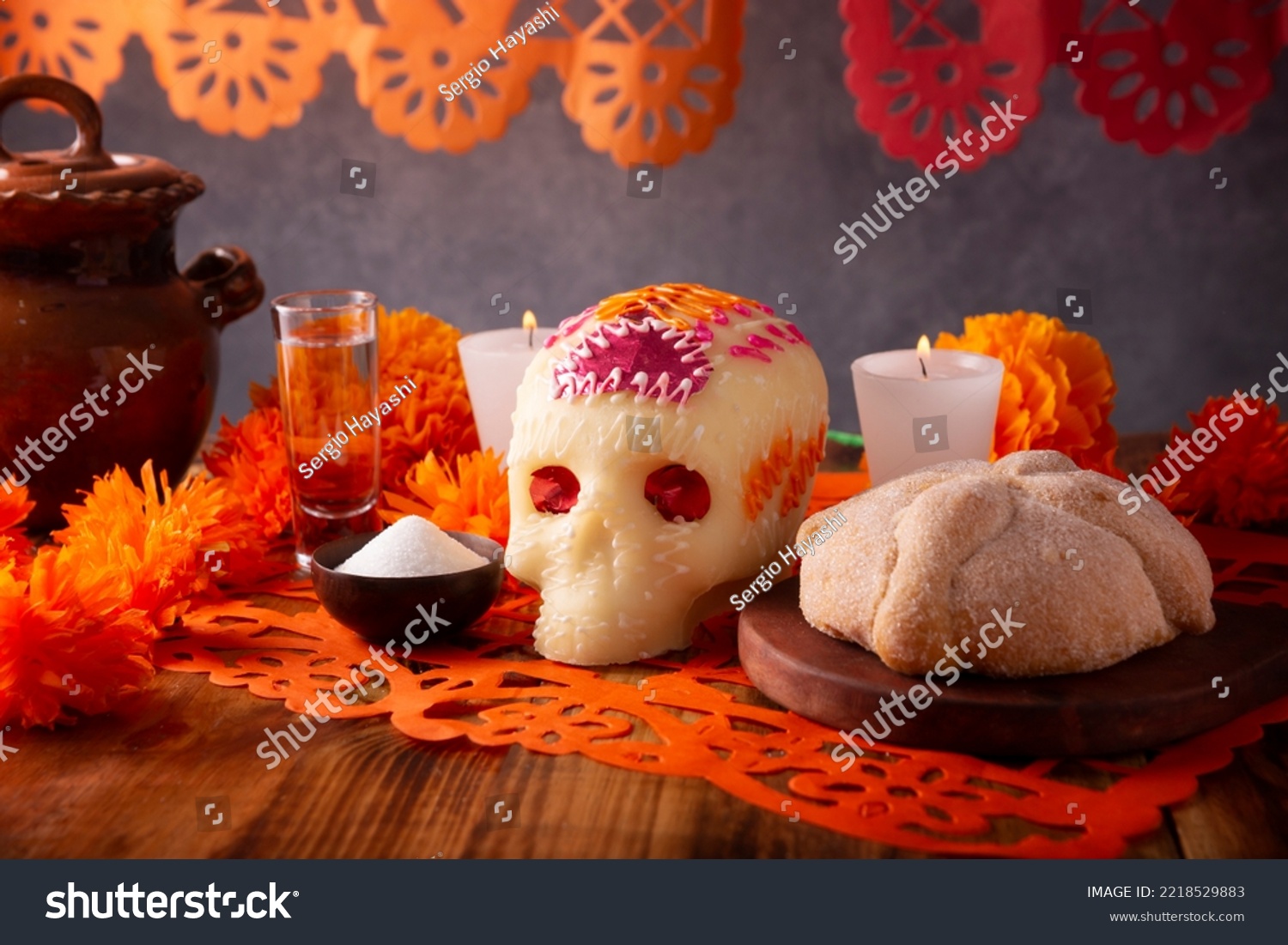 Pan de Muerto with sugar skull and Cempasuchil flowers or Marigold and Papel Picado. Decoration traditionally used in altars for the celebration of the day of the dead in Mexico #2218529883