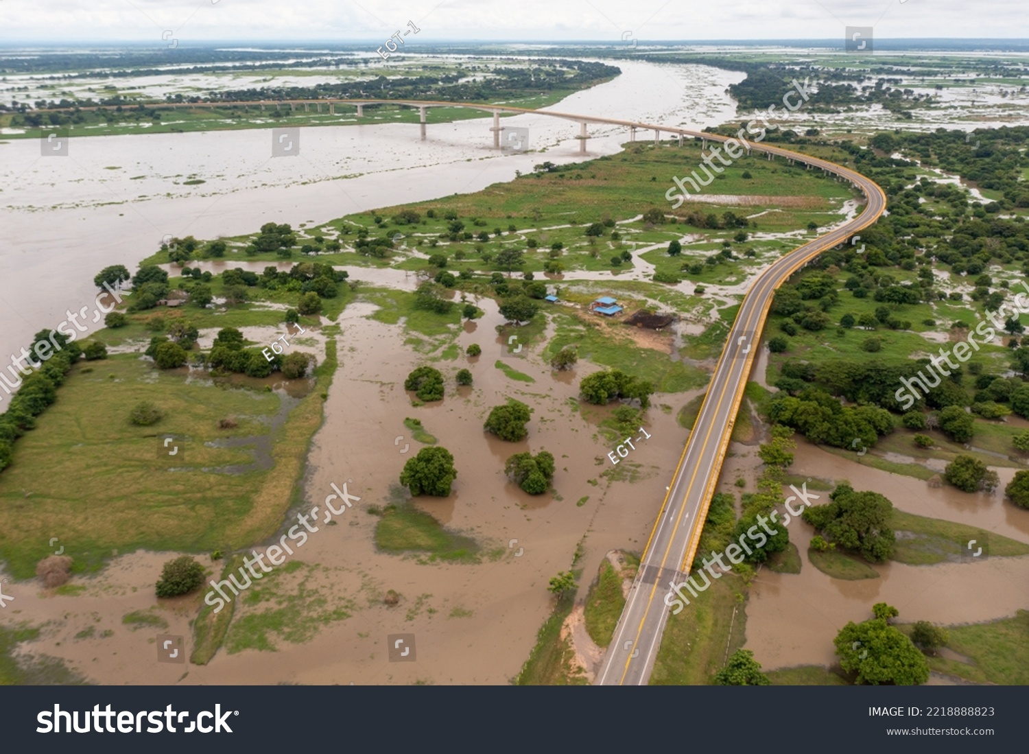 Flooding of the Magdalena river in a farm that is near the El Roncador bridge. Colombia. #2218888823