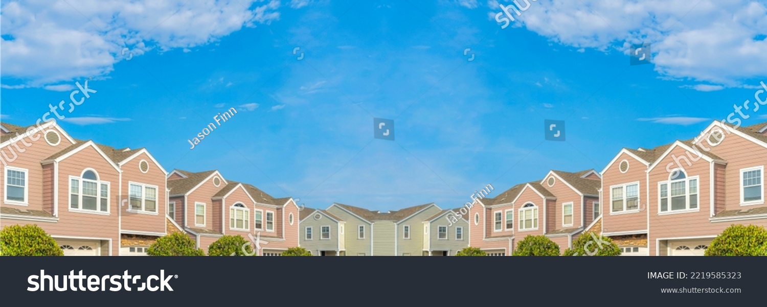 Abstract mirrored background Neighborhood townhouses with pink and green exterior at Carlsbad, San Diego, California #2219585323