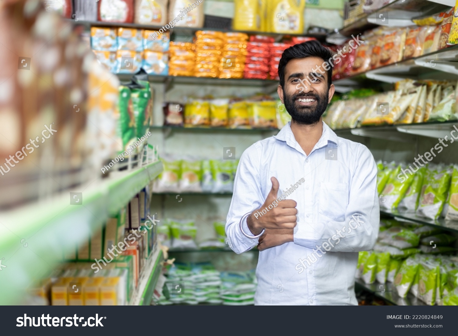 Indian shop keeper in Grocery store showing thumbs up #2220824849