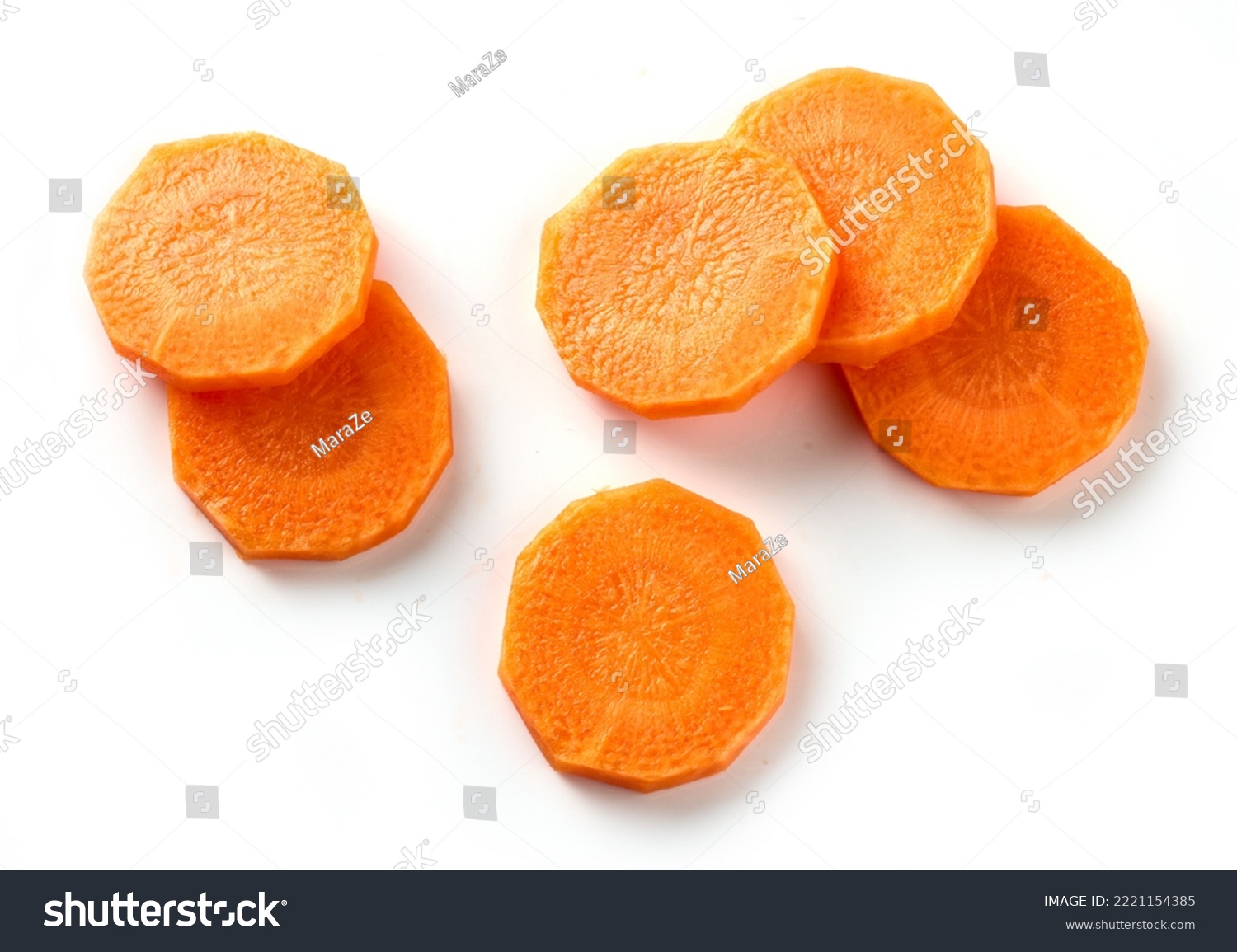 fresh raw carrot slices isolated on white background, top view #2221154385