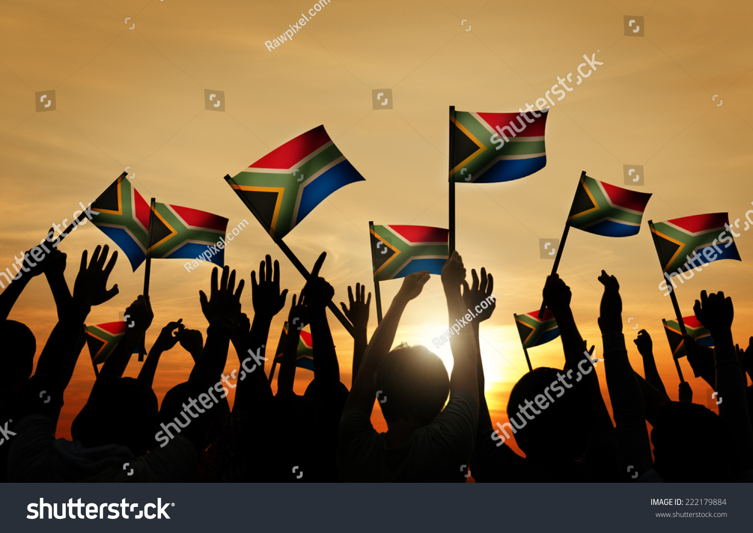 Group of People Waving South African Flags in Back Lit #222179884
