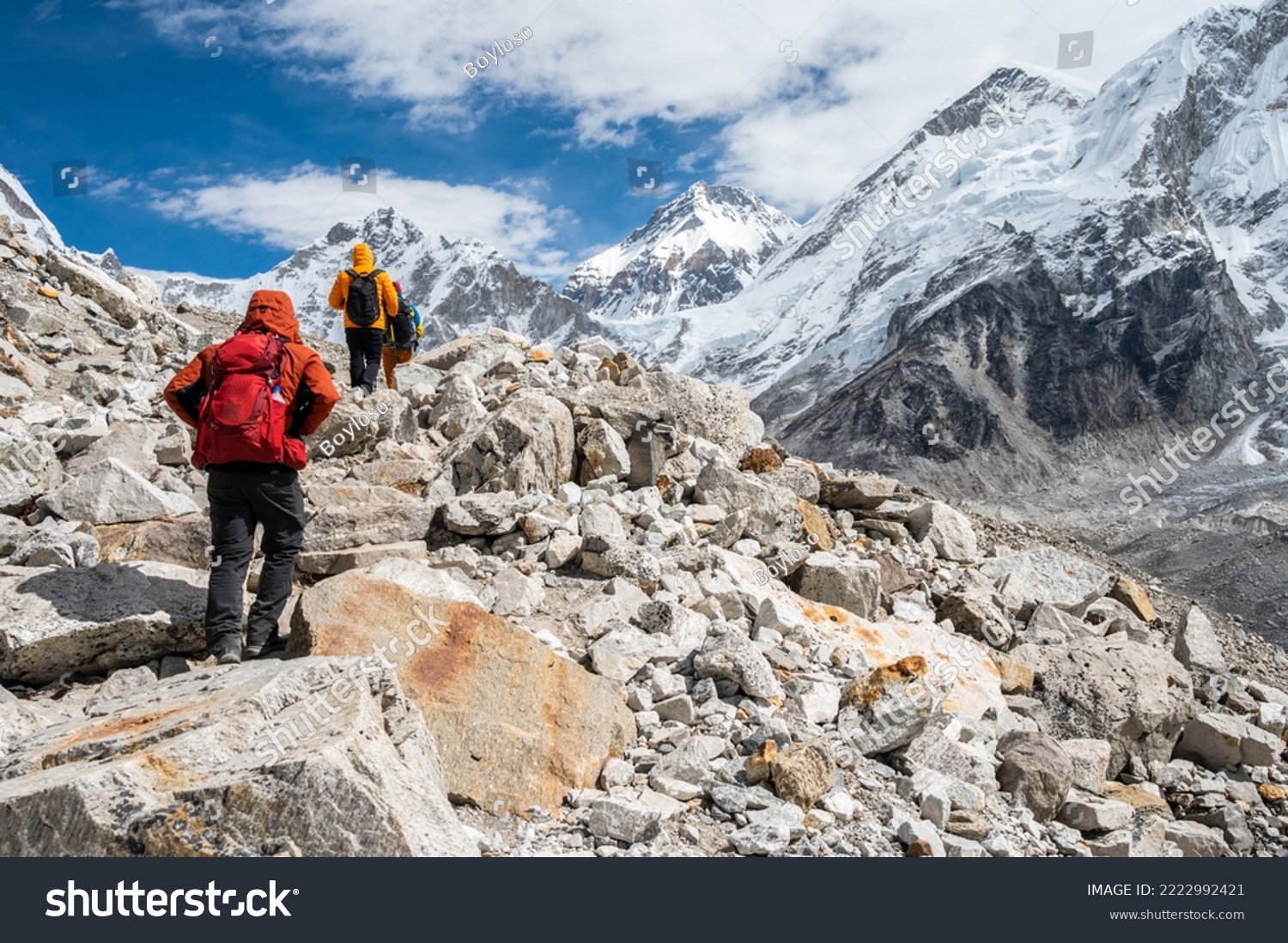 Rear view of tourist while trekking to Everest Base Camp in Nepal. Everest Base Camp Trek is undoubtedly the adventure of a lifetime and one of Nepal's best trekking destination. #2222992421