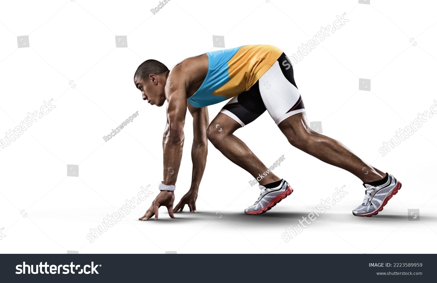 Sport white background. Sprinter leaving starting blocks on the running track. #2223589959