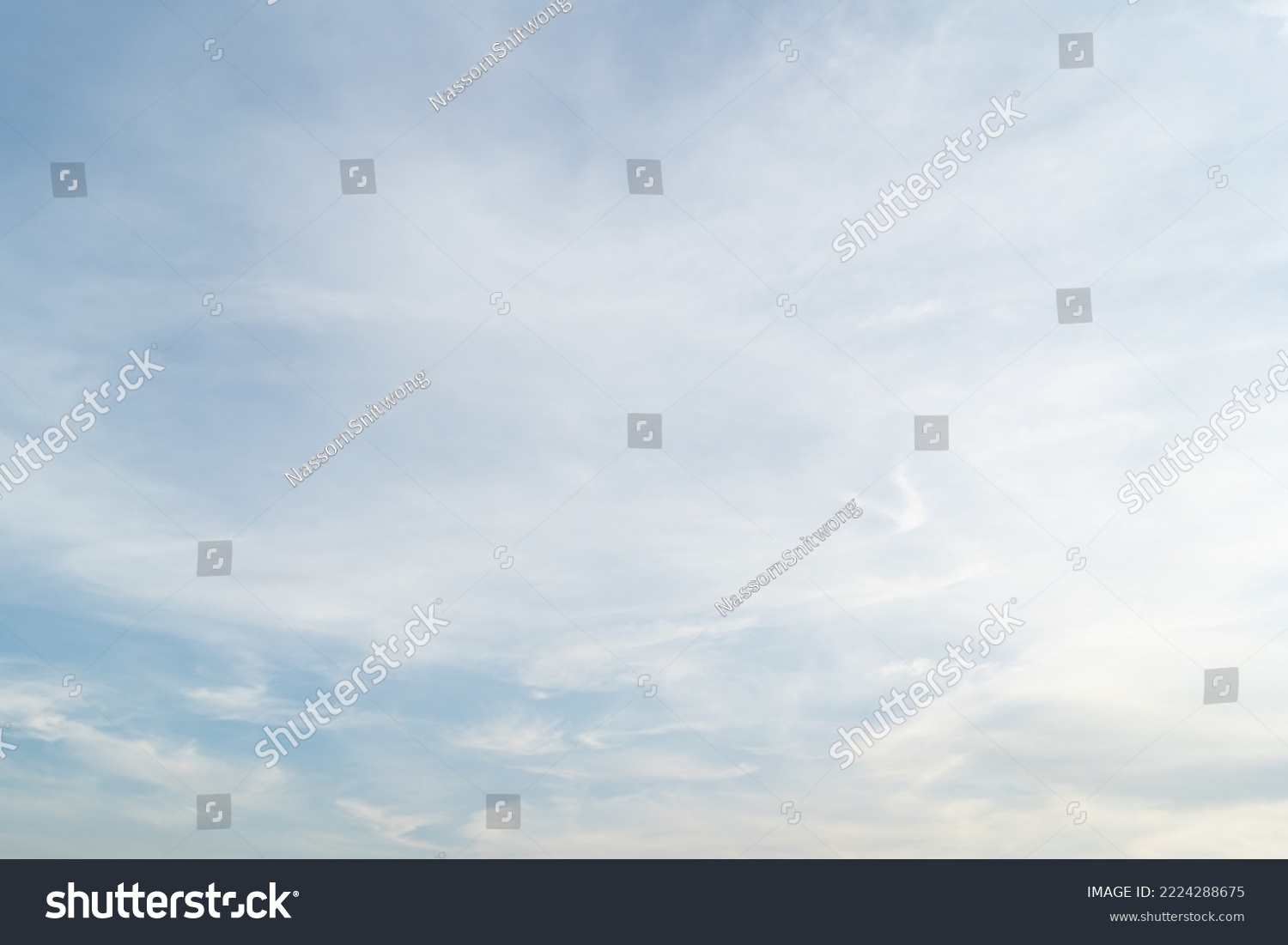 Beautiful blue sky bright midday sun with fluffy clouds. Summer sunshine with white cloudscape background. Natural scenic sunny day horizon sky wallpaper backdrop. #2224288675