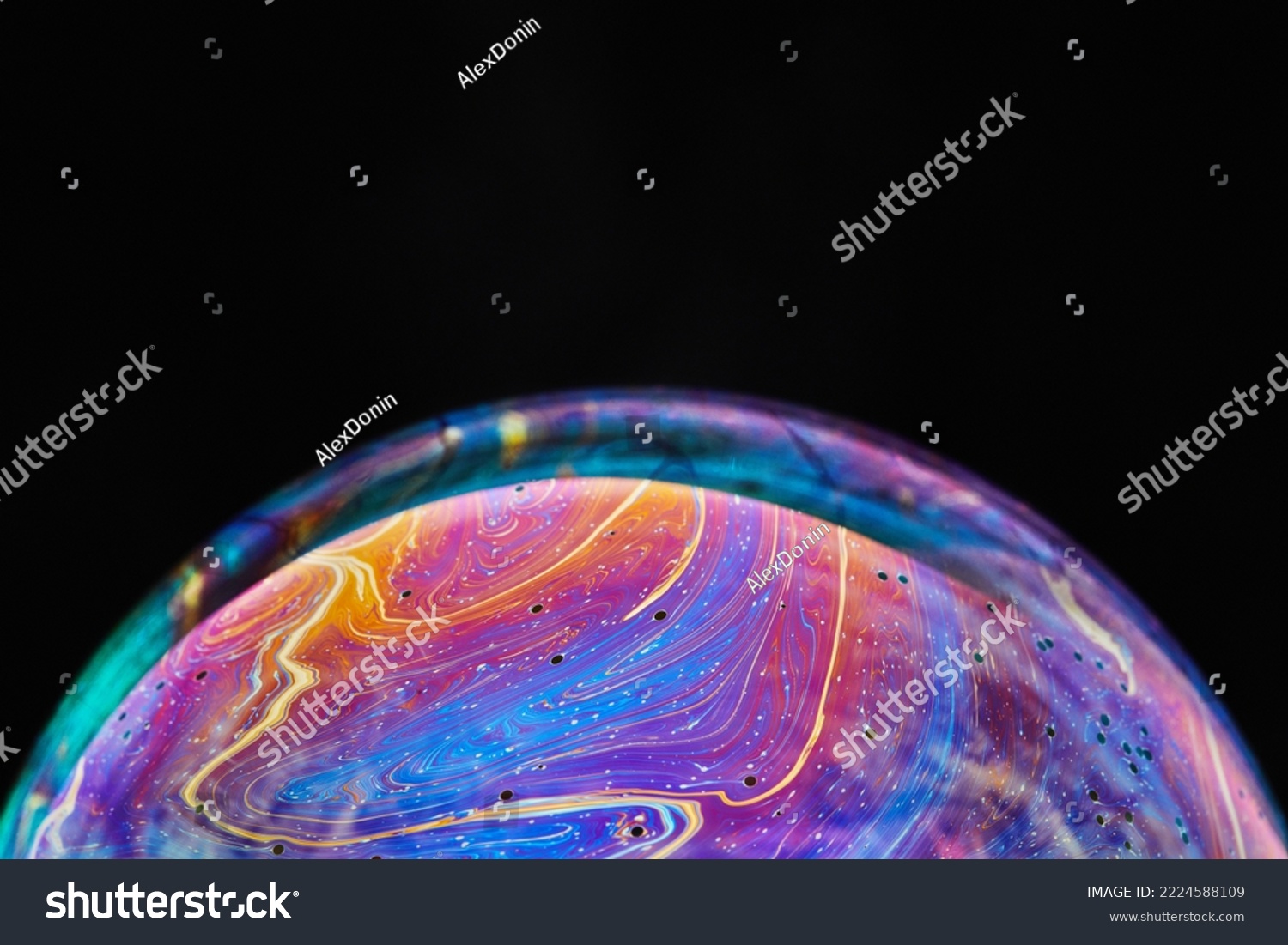 Virtual reality space with abstract multicolor psychedelic planet. Closeup Soap bubble like an alien planet on black background #2224588109