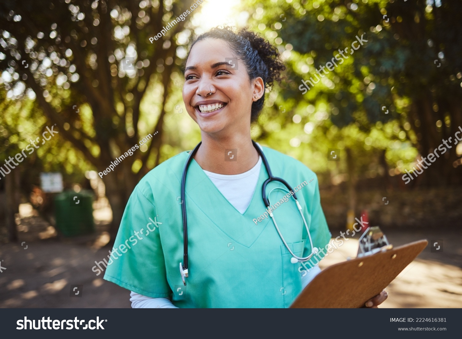 Woman, nurse and smile with clipboard in the park for healthcare, medical or consultation and assistance. Happy female doctor or veterinary in nursing check, inspection or prescription advice outside #2224616381