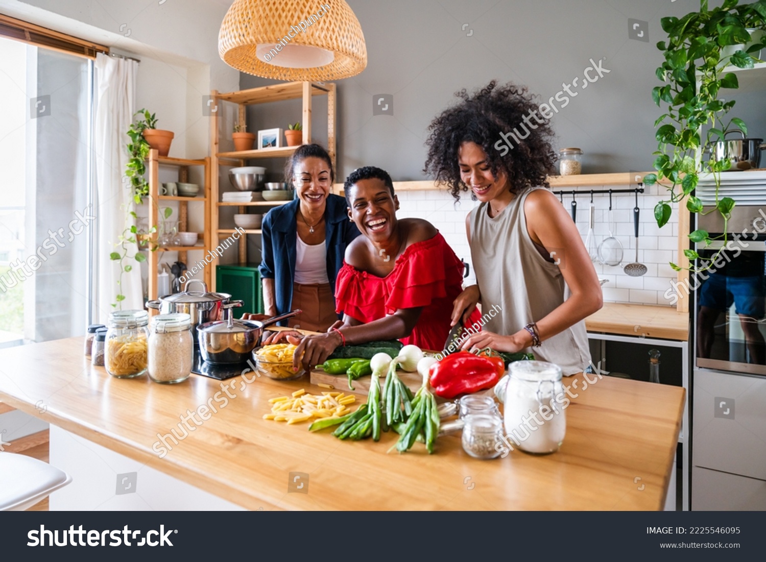 Happy beautiful hispanic south american and black women meeting indoors and having fun - Black adult females best friends spending time together, concepts about domestic life, leisure, friendship #2225546095