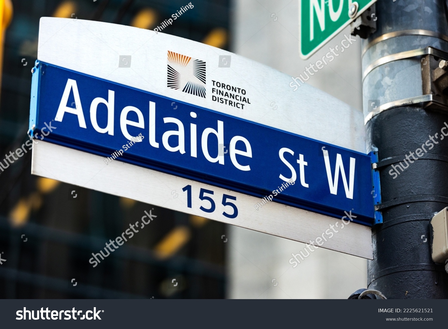 Adelaide Street West street sign in downtown Toronto's financial district. Ontario Canada. #2225621521