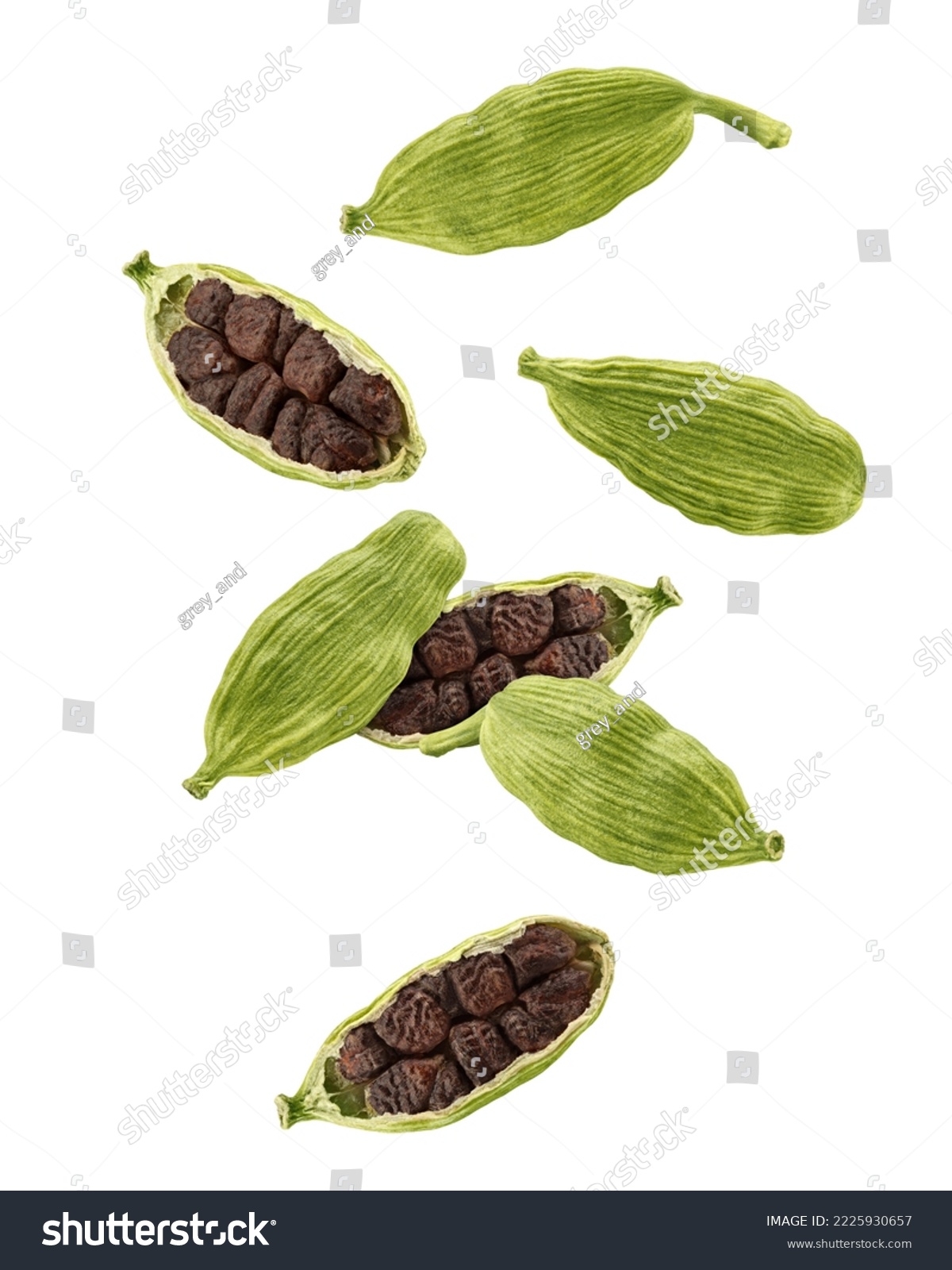 Falling Cardamom isolated on white background, clipping path, full depth of field #2225930657