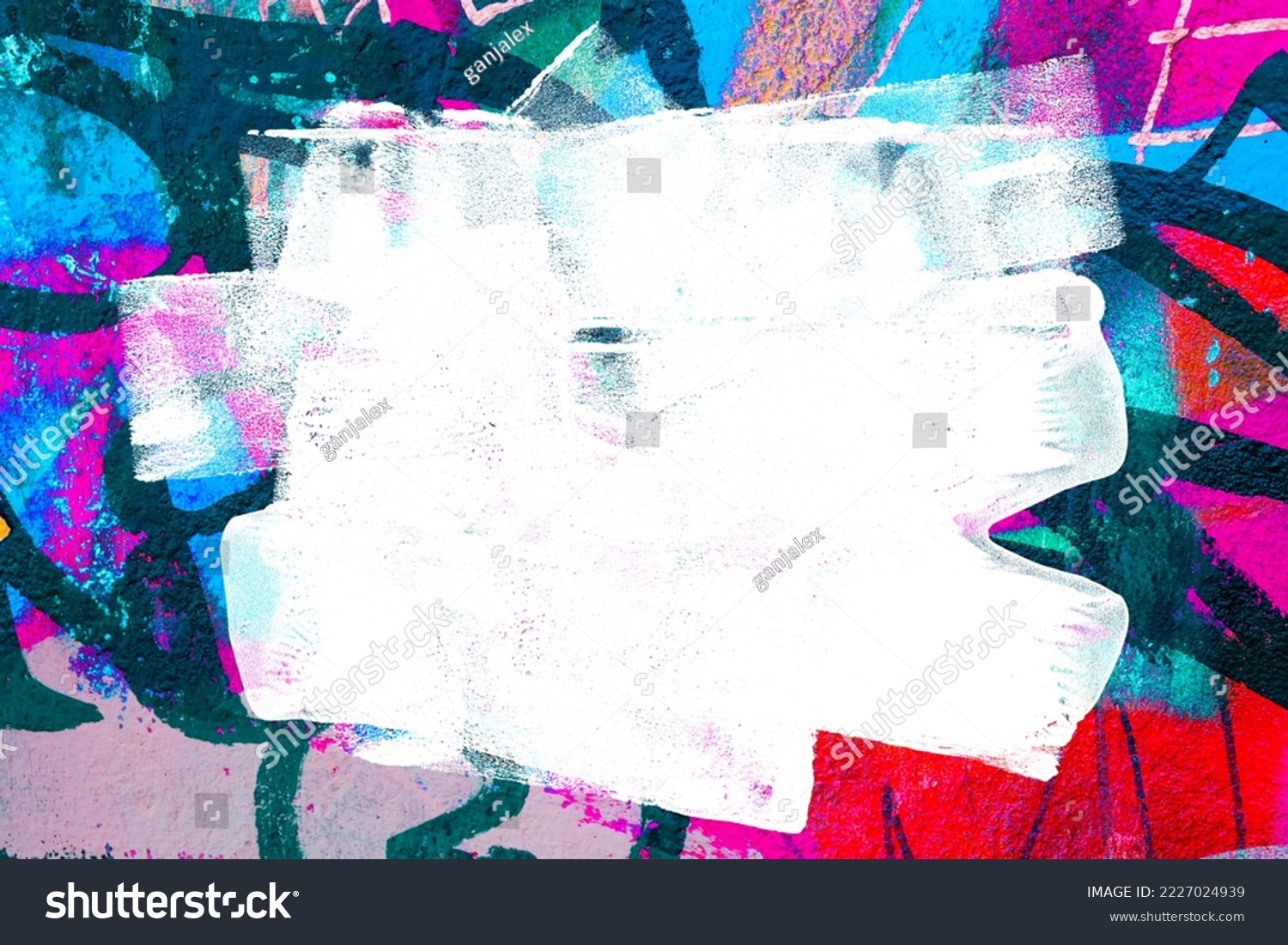 Closeup of colorful teal, blue and red urban wall texture with white white paint stroke. Modern pattern for design. Creative urban city background. Grunge messy street style background with copy space #2227024939