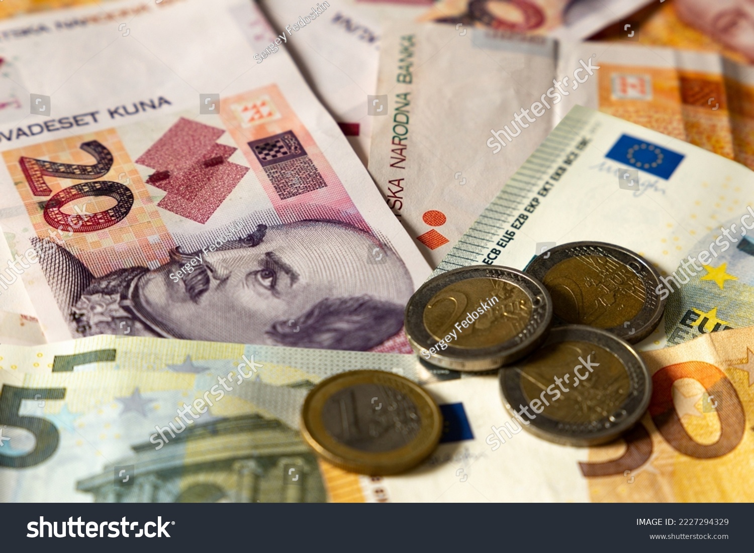 Croatia joins the eurozone.
Croatian banknotes and European banknotes (Kuna and Euro). #2227294329