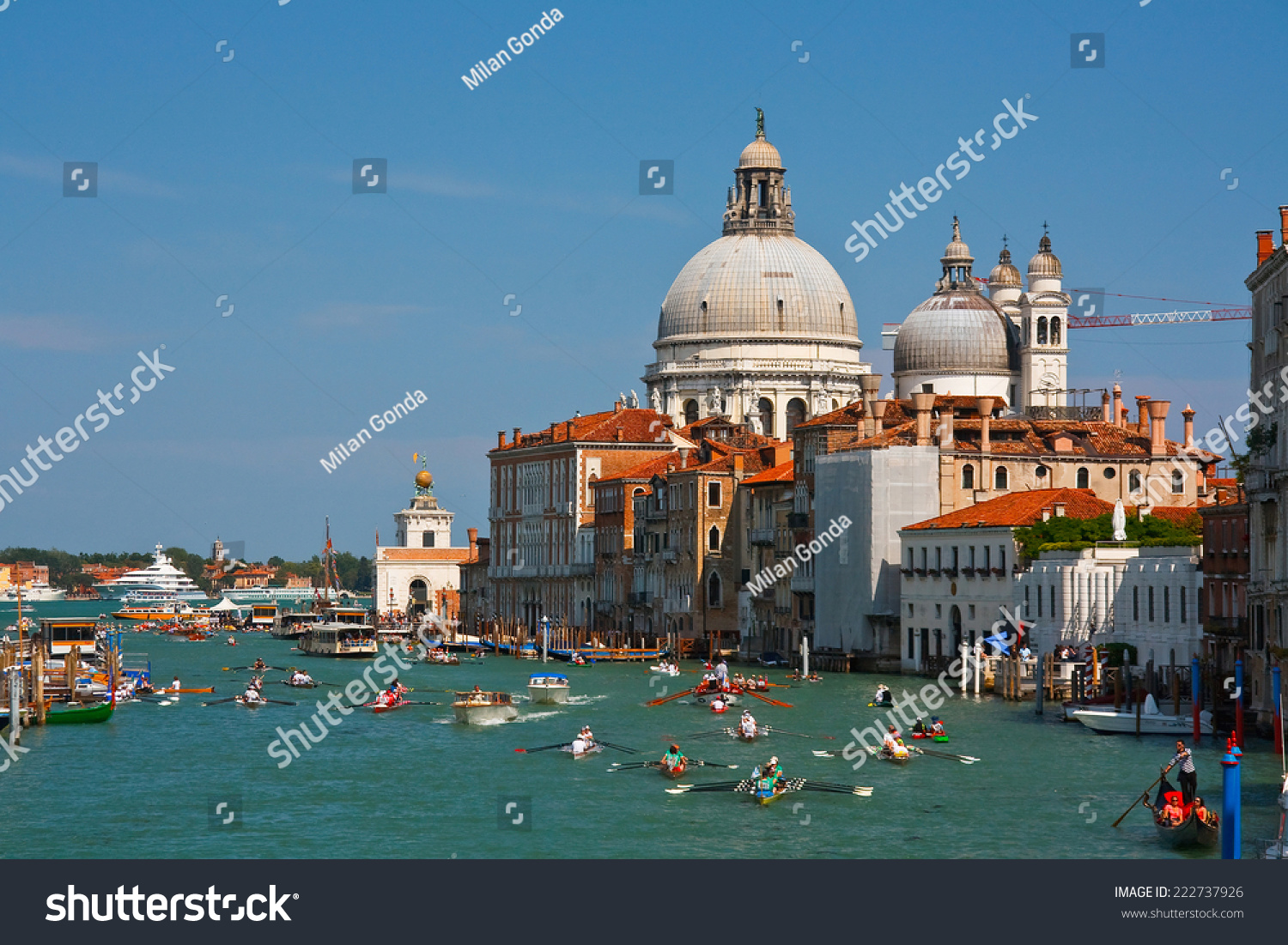 Venice, Italy  May 27 2012: Rowing boats during the Vogalonga event in Venice, Italy. #222737926