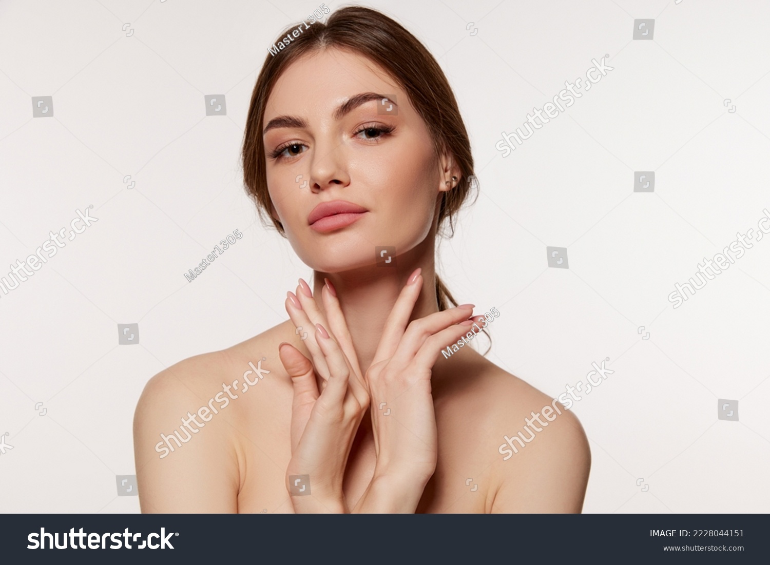 Portrait of young beautiful woman with perfect smooth skin isolated over white background. Facebuilding. Concept of natural beauty, plastic surgery, cosmetology, cosmetics, skin care #2228044151