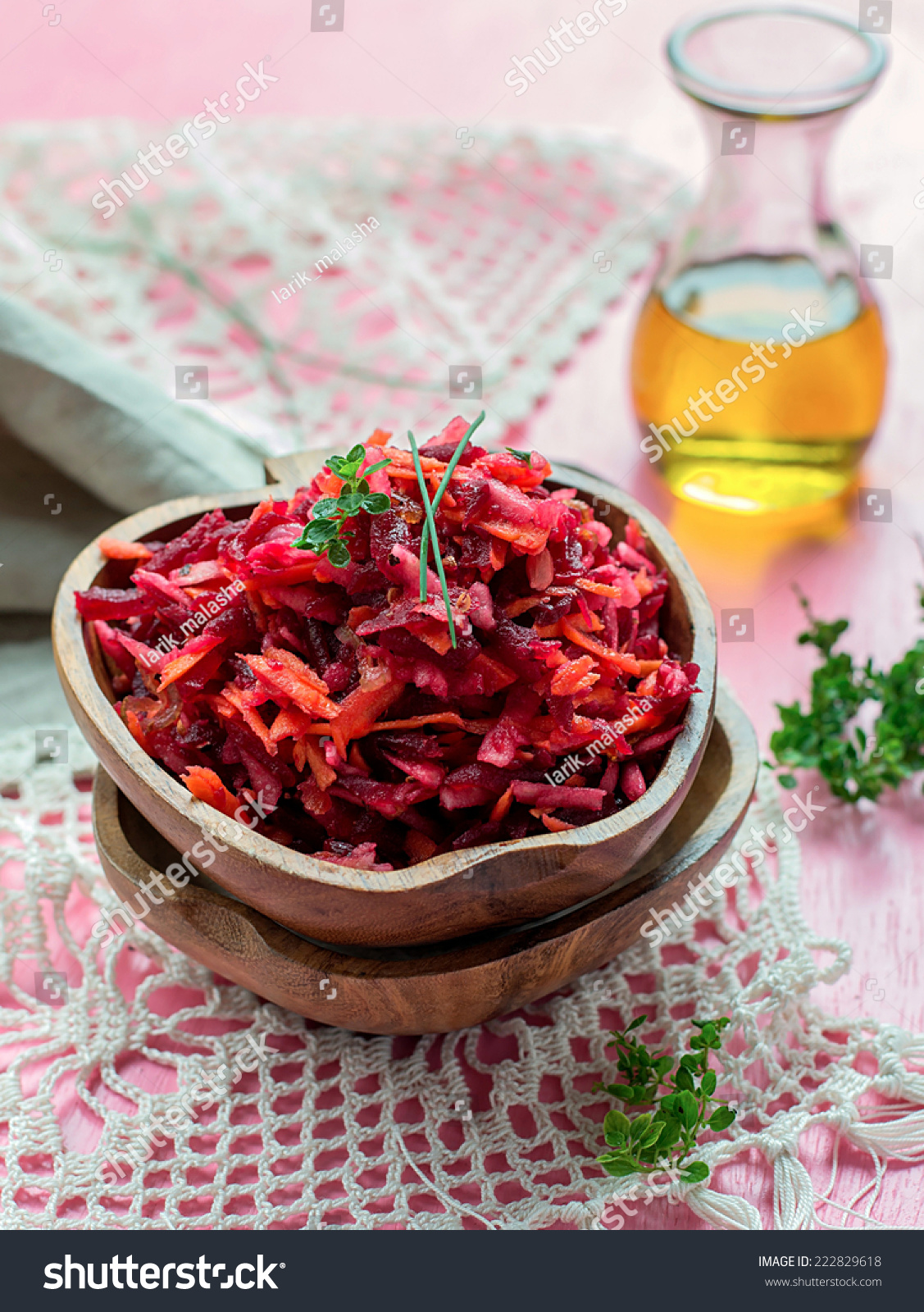Fresh salad with beetroot, carrots and apples on pink background #222829618