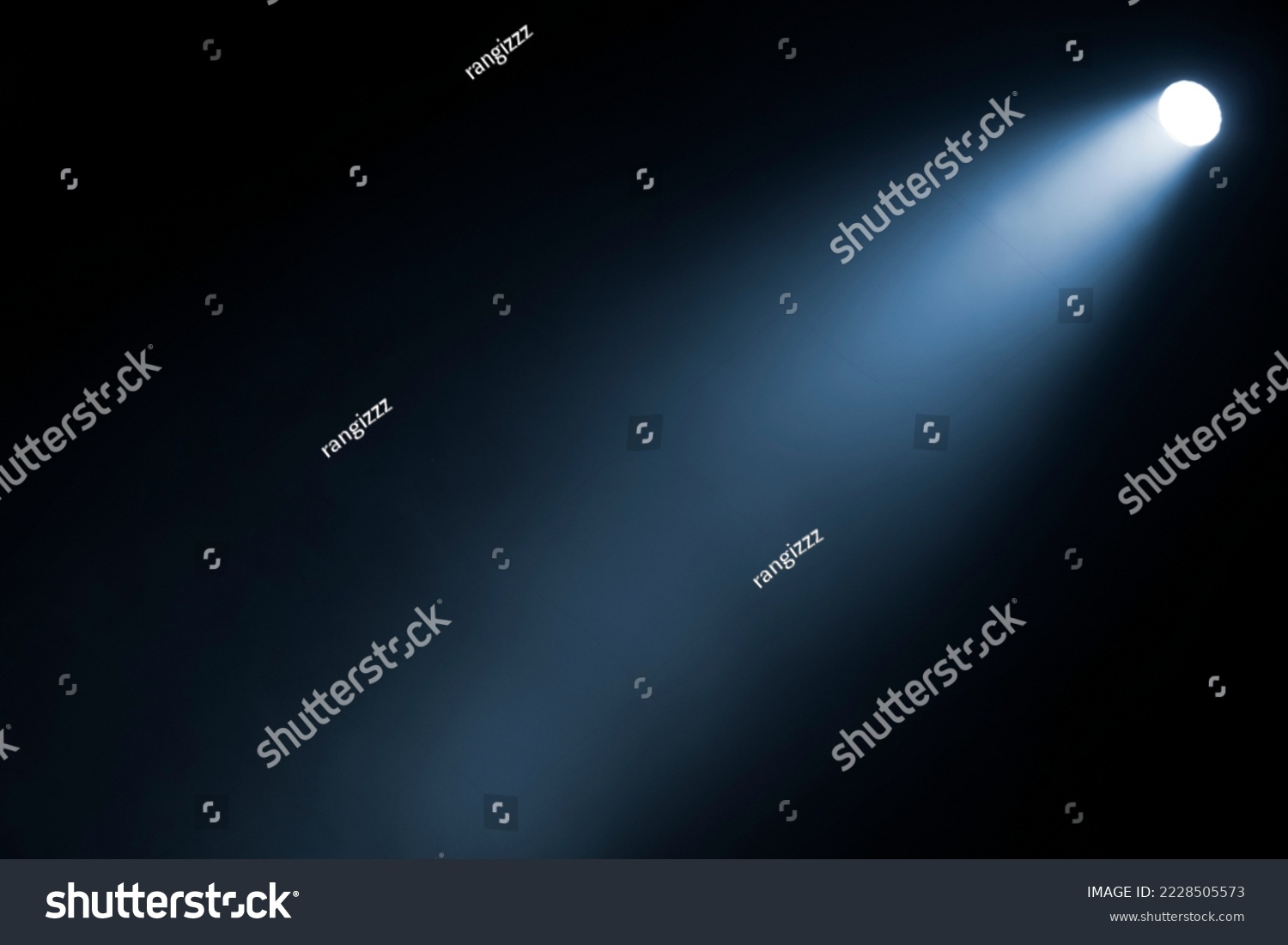 Close up of light beam isolated on black background #2228505573