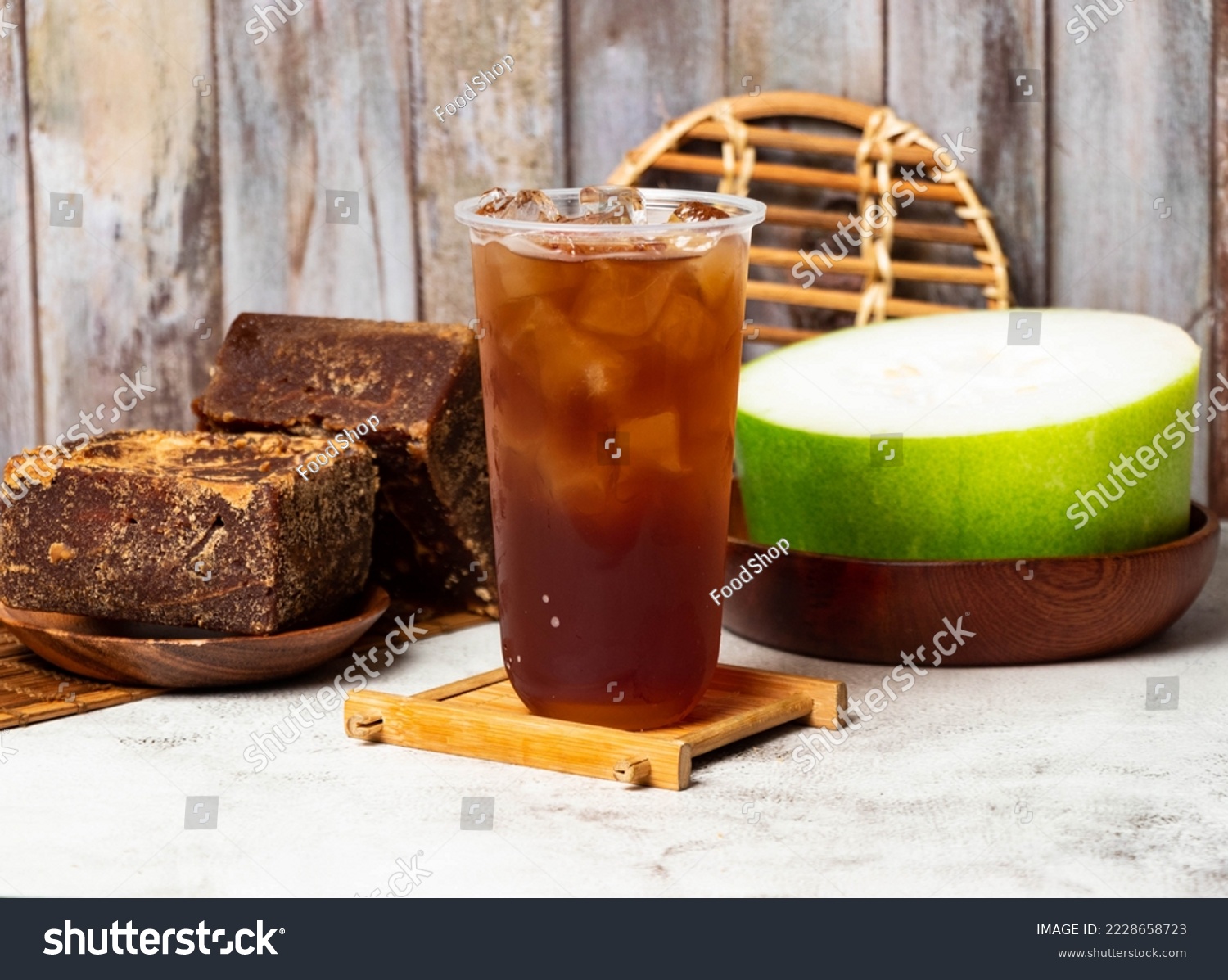winter melon tea served in disposable cup isolated on table side view taiwan style #2228658723