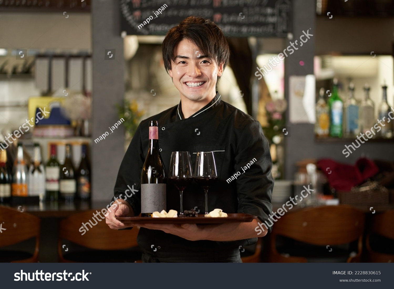 Asian man working in a restaurant #2228830615