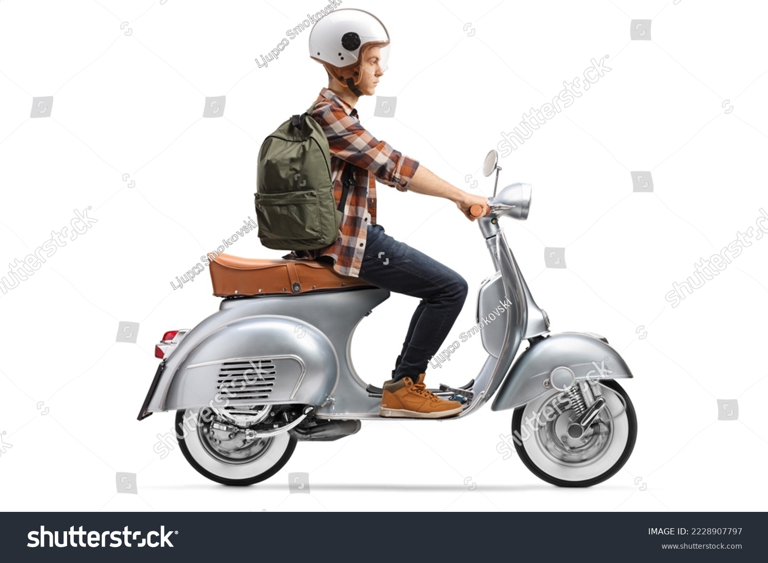 Male student with a helmet riding a scooter isolated on white background #2228907797