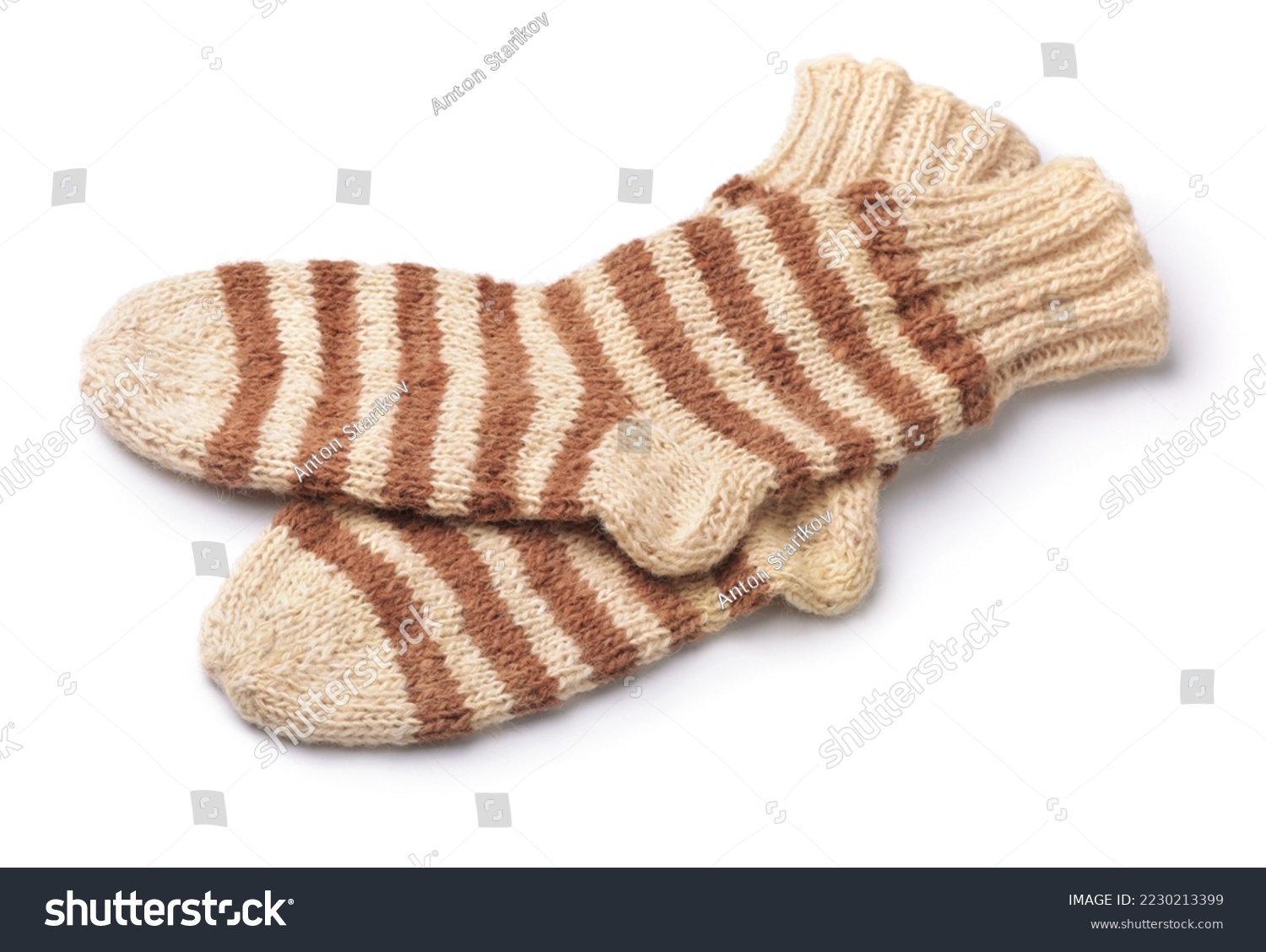 Pair of striped woolen knitted socks isolated on white #2230213399