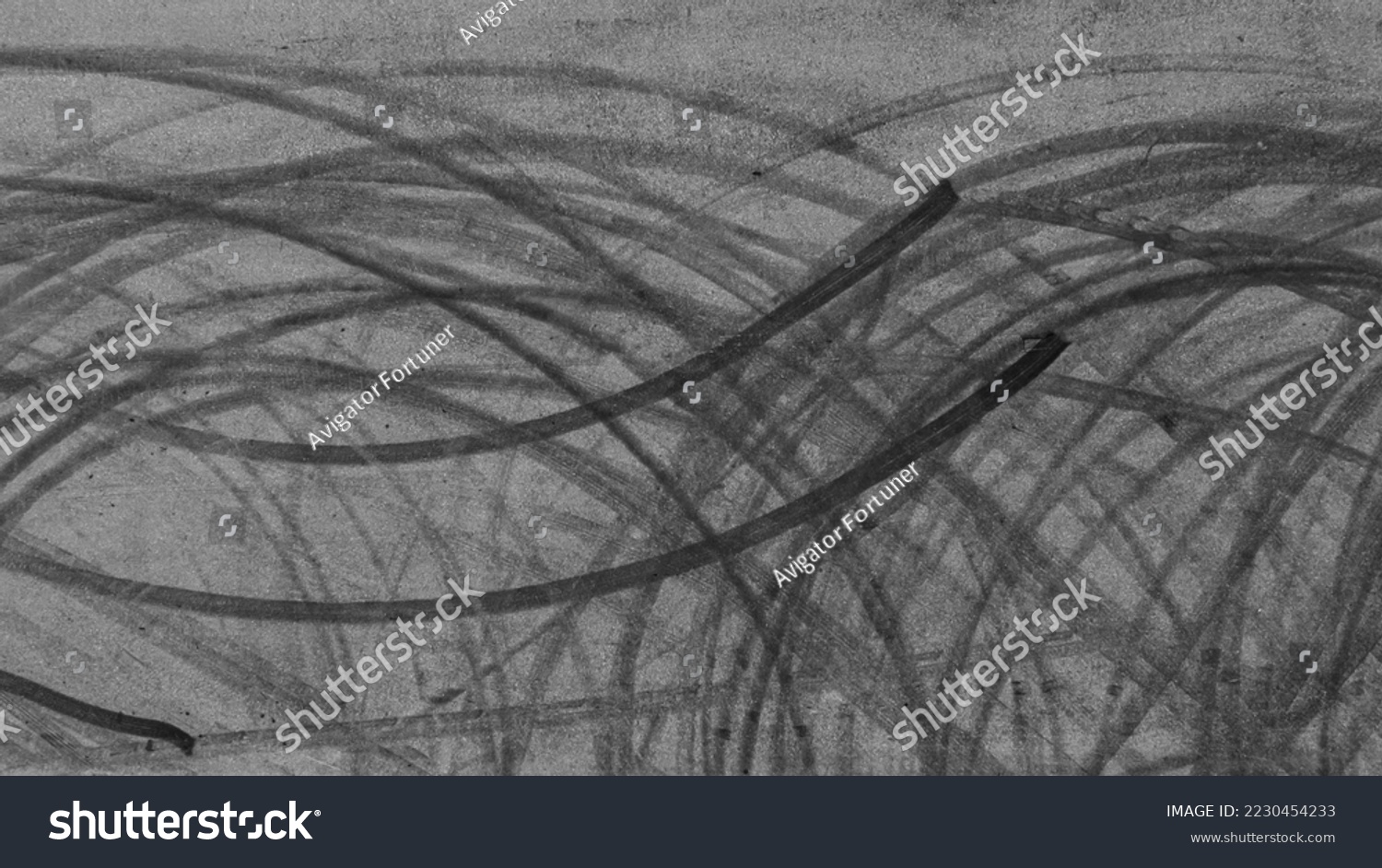 Aerial view tire track mark on asphalt tarmac road race track texture and background, Abstract background black tire track skid on asphalt road, Tire mark skid mark on asphalt road. #2230454233